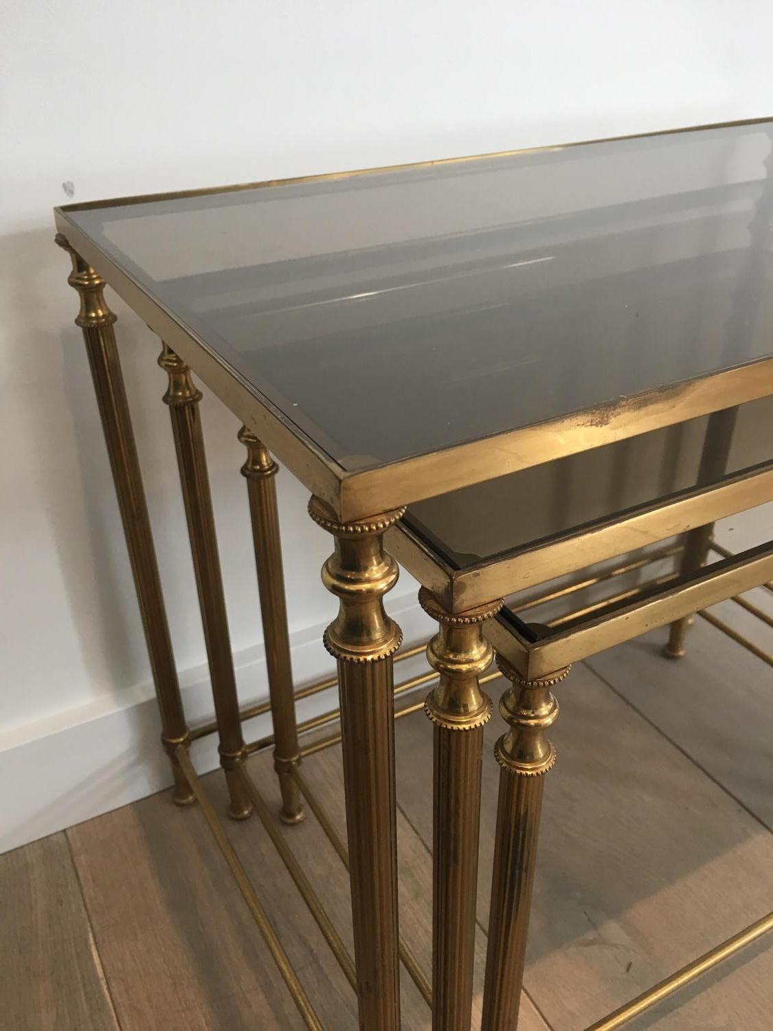 In the style of Maison Jansen. Pair of Neoclassical Nesting Tables Sets in Brass 10