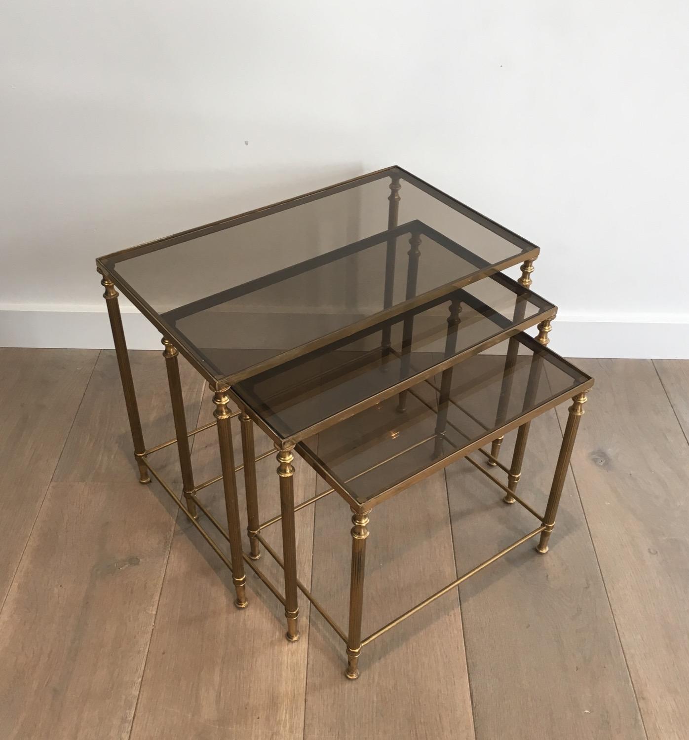 Bronzed In the style of Maison Jansen. Pair of Neoclassical Nesting Tables Sets in Brass