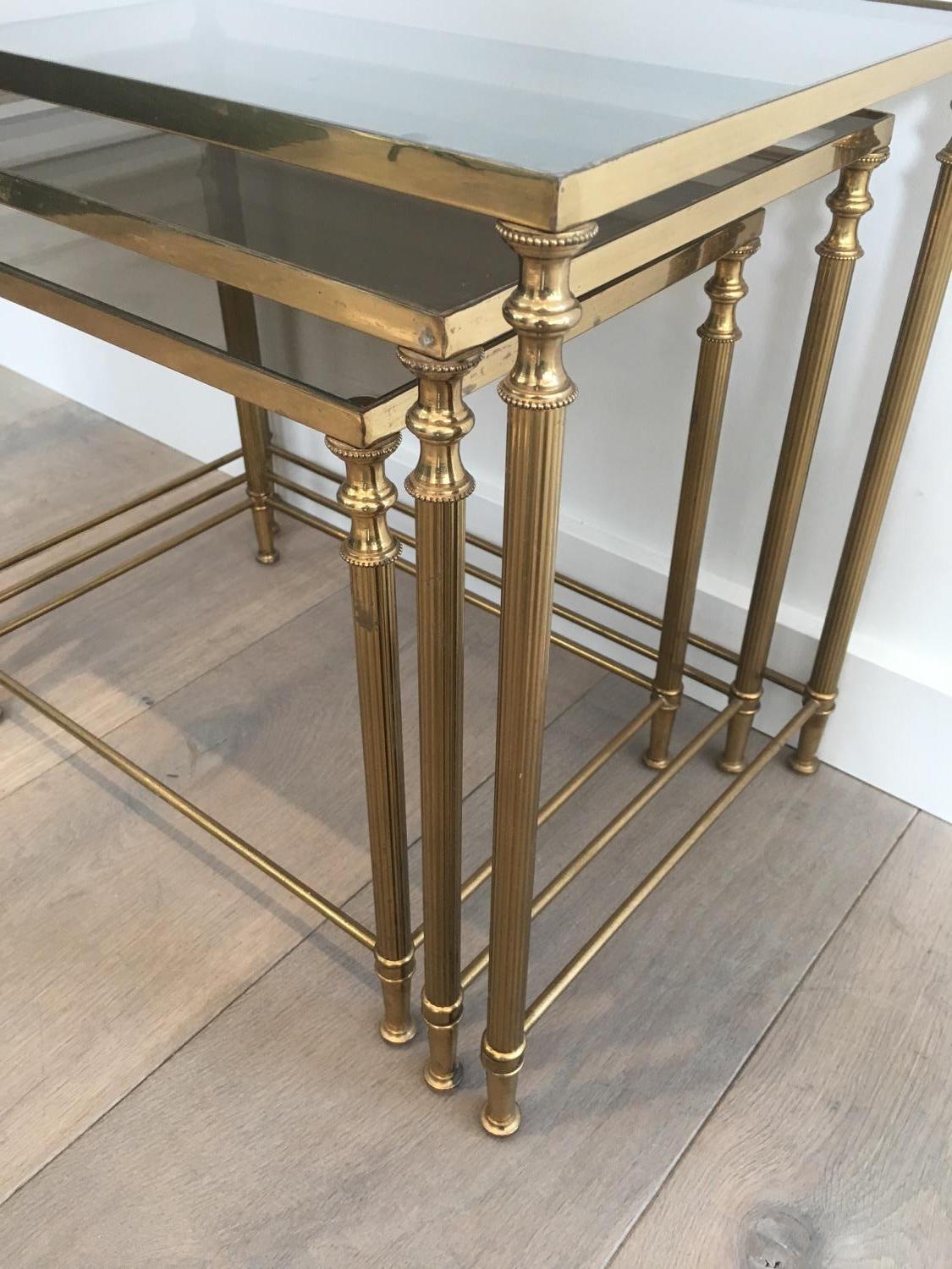 In the style of Maison Jansen. Pair of Neoclassical Nesting Tables Sets in Brass 2