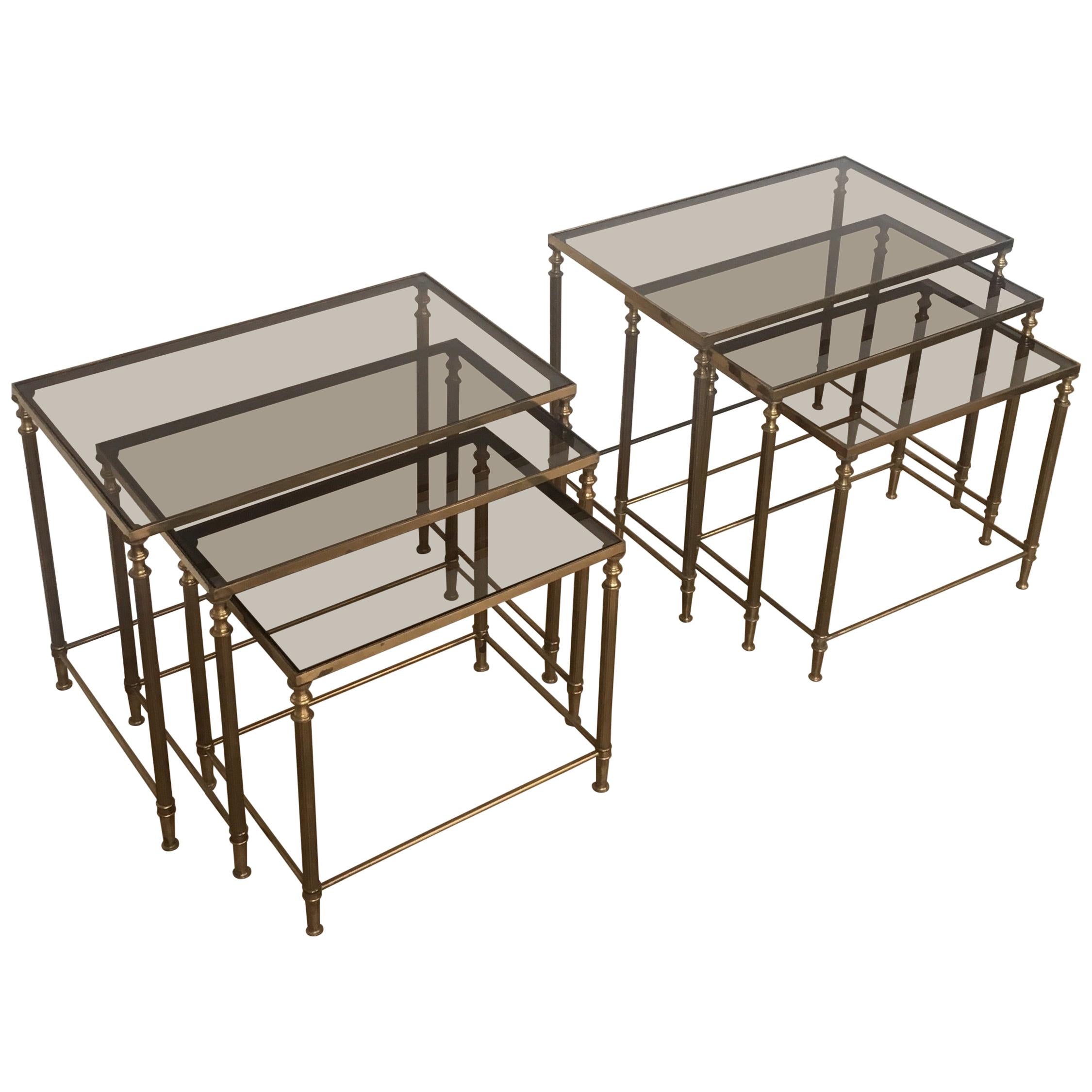 In the style of Maison Jansen. Pair of Neoclassical Nesting Tables Sets in Brass