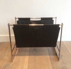 In the Style of Poul Kjaerholm, Brushed Steel and Black Leather Magazine Rack