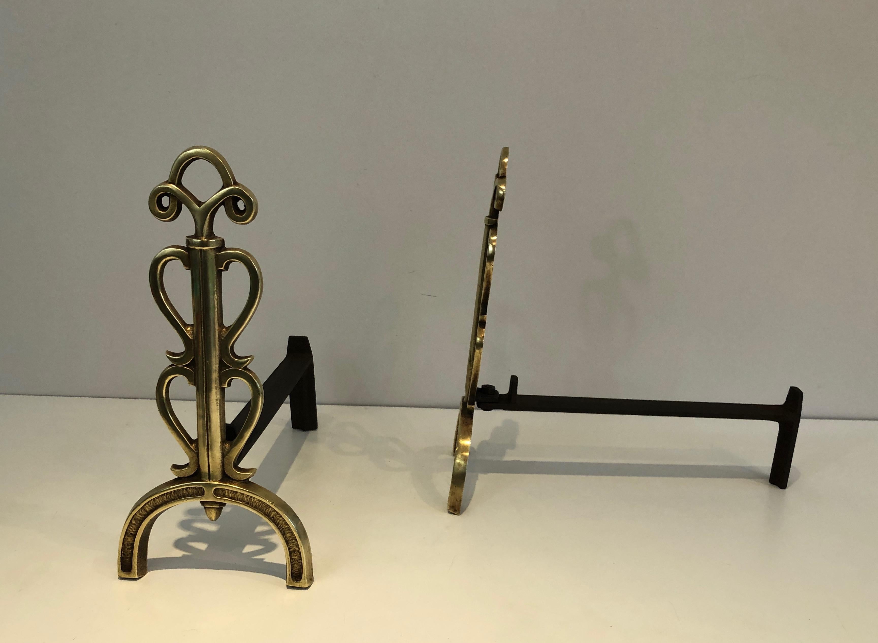 In the Style of Raymond Subes, Pair of Brass and Wrought Iron Andirons, French In Good Condition In Marcq-en-Barœul, Hauts-de-France