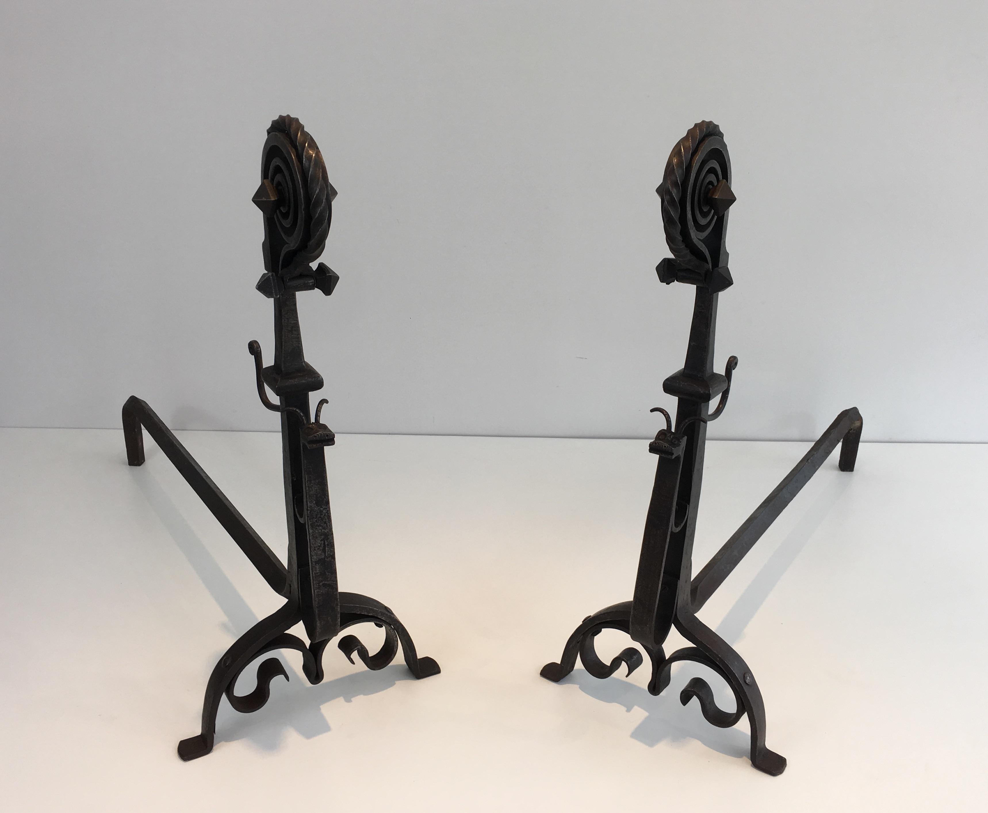French Pair of Hammered and Wrought Iron Snails Andirons in the Style of Schenck For Sale
