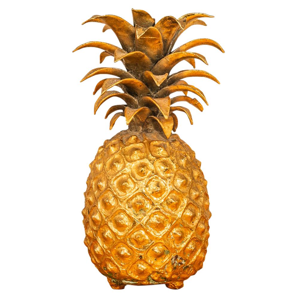 In the style of the Maison Charles, pair of pineapples, 
Golden brass, 
circa 1980, France.

Measures: Height 32 cm, diameter 20 cm.