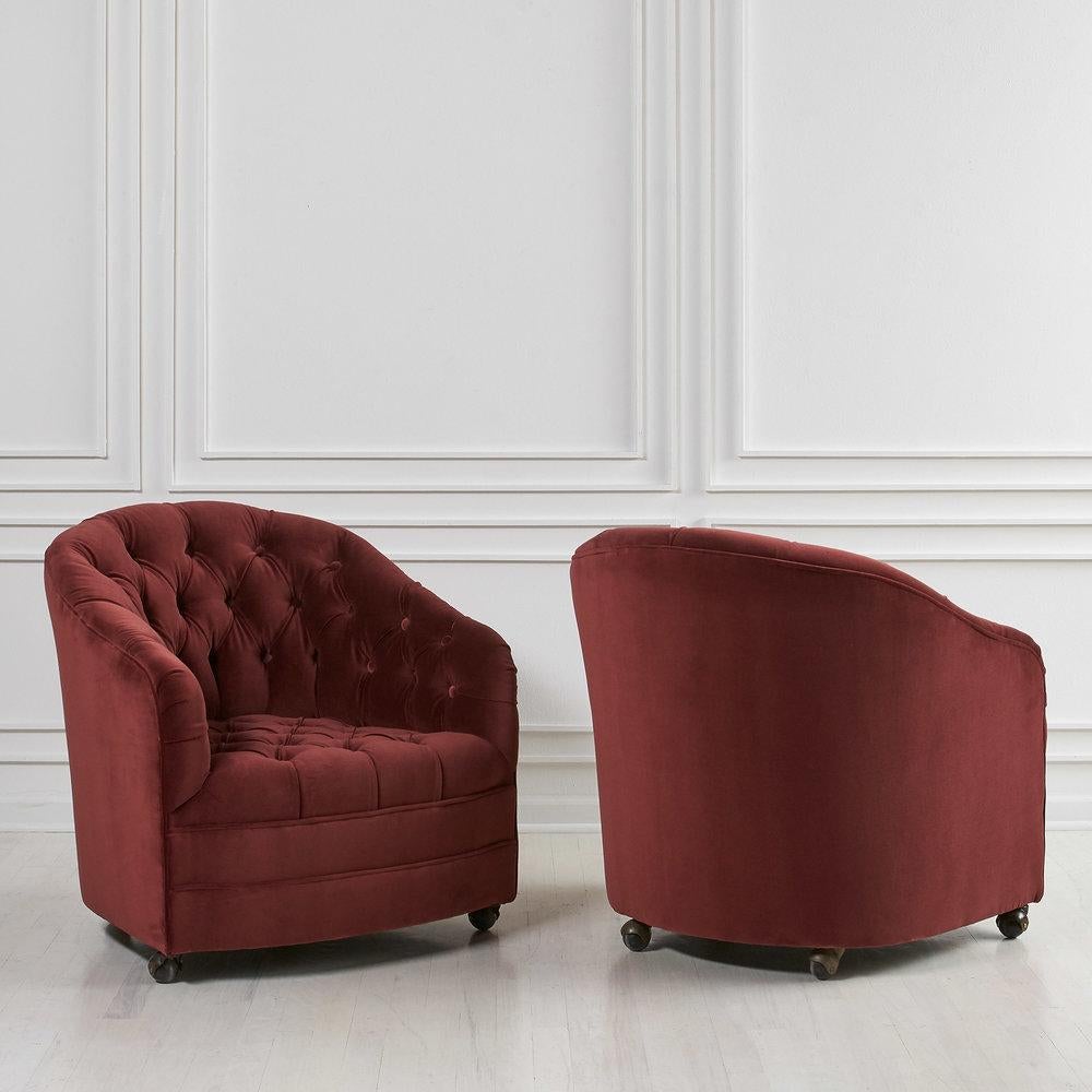 A beautiful pair of tufted swivel chair, restored and featured in a deep Bordeaux velvet. In the style of Ward Bennet, circa 1960s.

Dimensions: 28” W x 30” D x 30” H

Seat height 15”

Condition: Excellent.