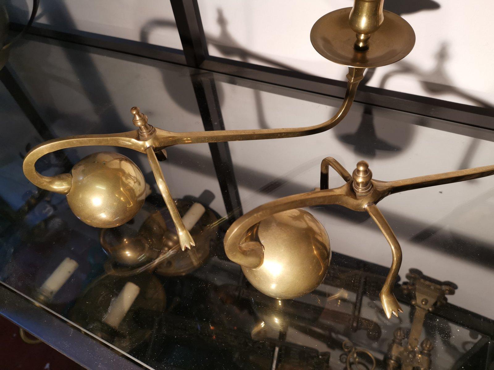 Spanish In the Style of Was Benson, A Pair of Brass Arts & Crafts Piano Candle Holders.