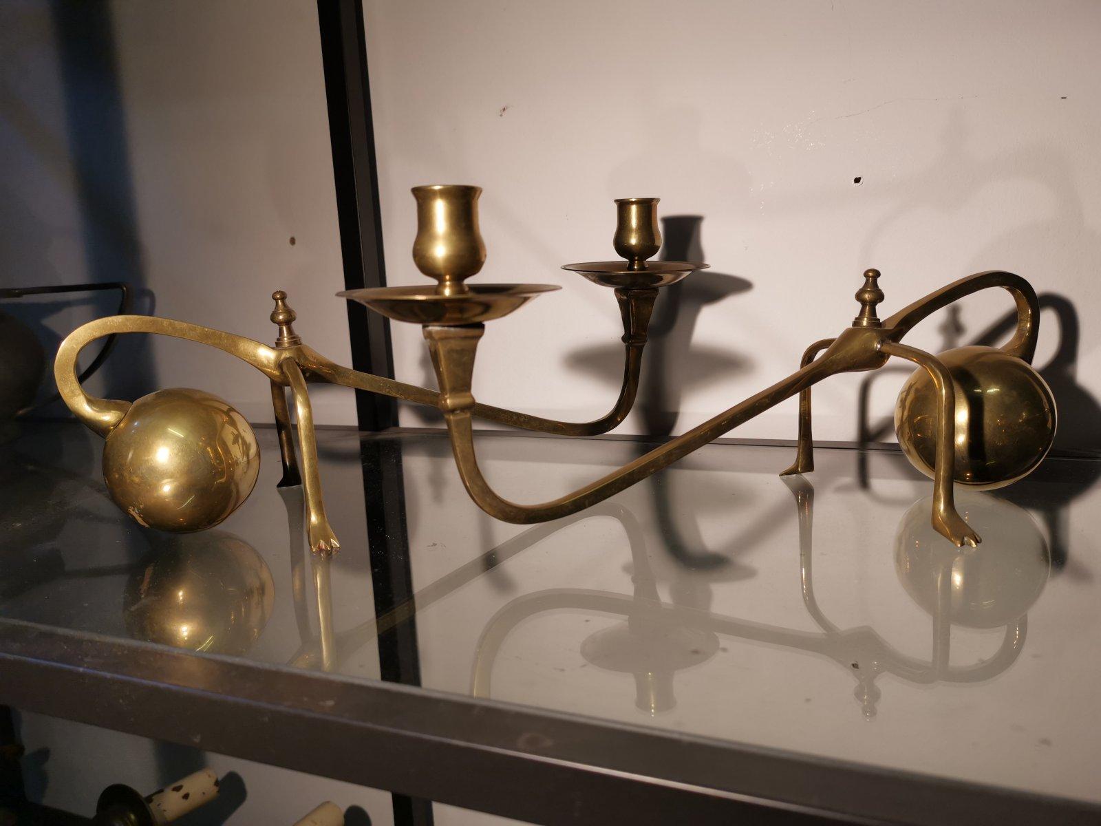 In the Style of Was Benson, A Pair of Brass Arts & Crafts Piano Candle Holders. 1