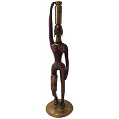 In the Styling’s of Karl Hagenauer, a lovely Bronze African Woman