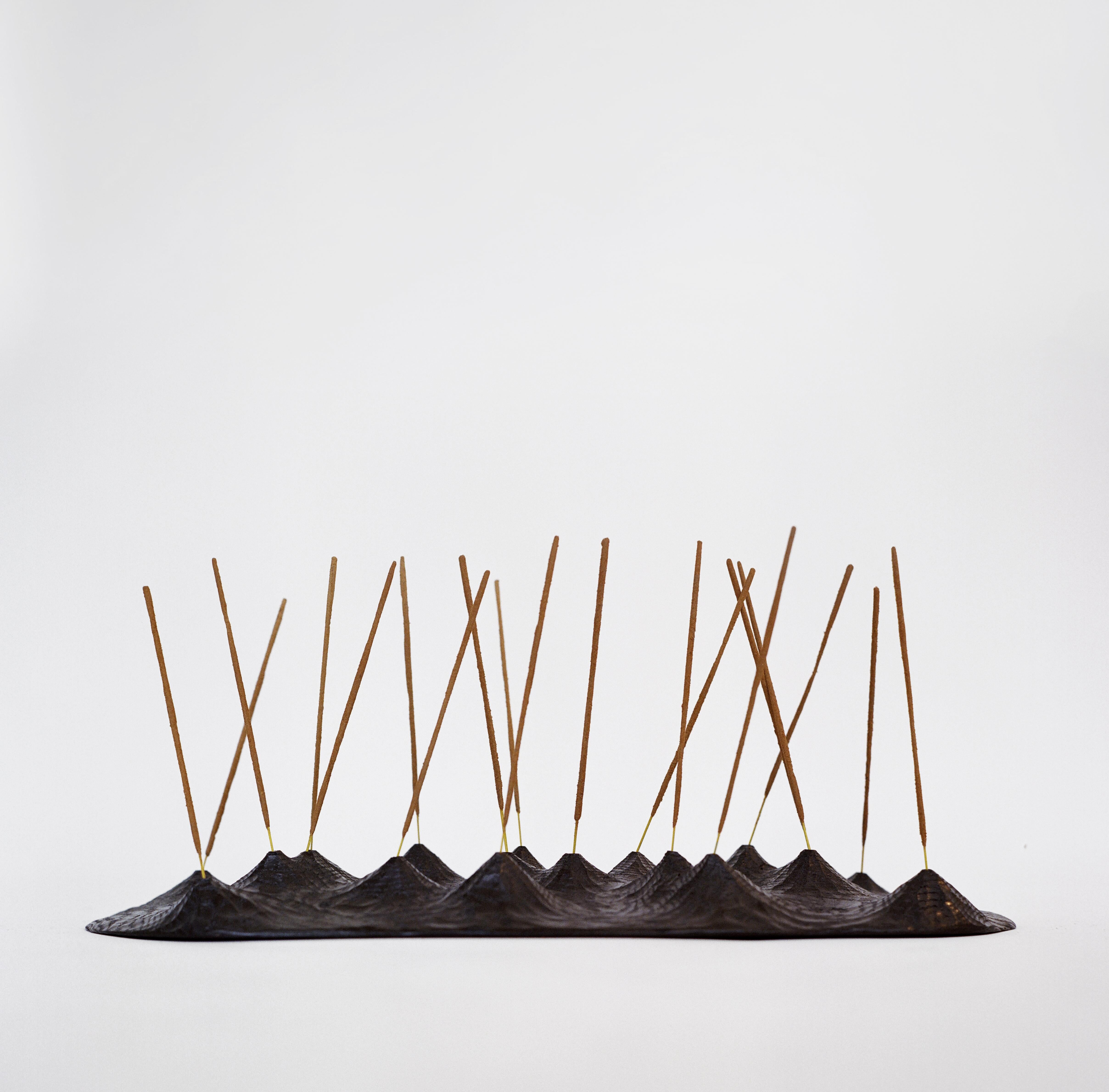 Incense Object by Henry D'ath
Dimensions: D 55 x W 20 x H 6 cm
Materials: Wood.
Available finishes: Black ink. 


Henry d’ath is a New Zealand-born, Hong Kong-based artist and architect. 
Using predominantly salvaged material, the artist routinely
