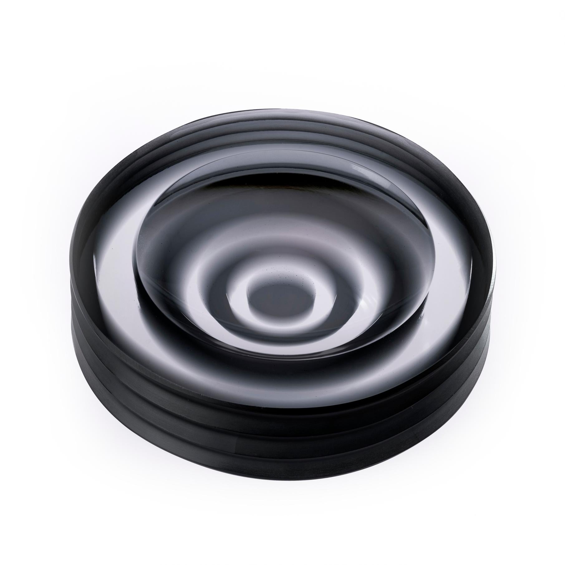 Incisioni Iridi Plissé Ashtray by Purho
Dimensions: D14x H3.5 cm
Materials: Glass
Other colours and dimensions are available.

Purho is a new protagonist of made in Italy design , a work of synthesis, a research that has lasted for years, an