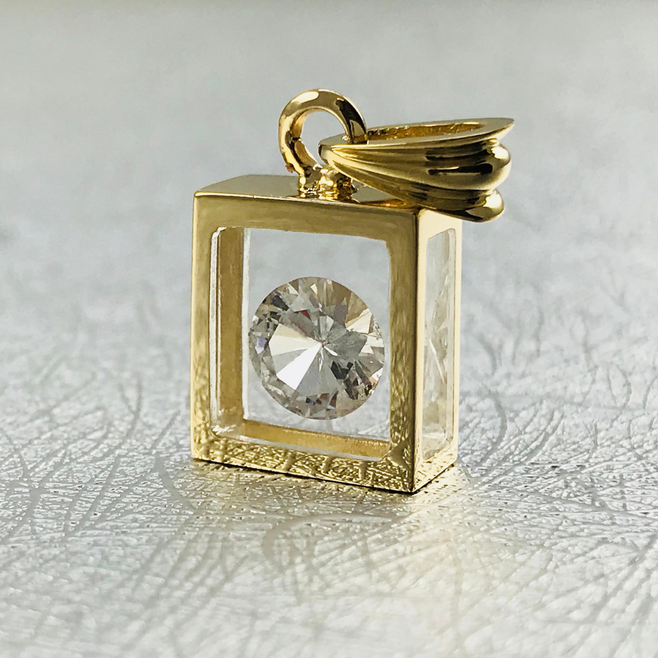 Pendentif flottant en diamant solitaire de 1,15 carat d'Incogem : or jaune 14k. Le pendentif est fabriqué à la main en or jaune 14k recyclé. Le diamant de 1,15 carat est de taille brillant, 58 facettes, de pureté I1 (G.I.A.) et de couleur G