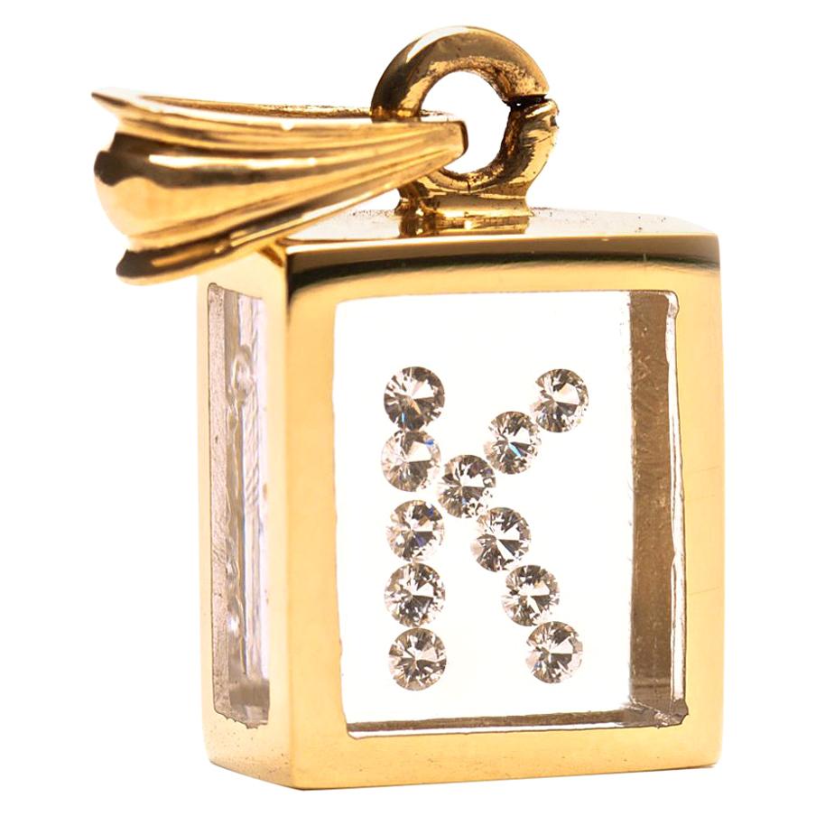 Ciondolo con diamante fluttuante Incogem, oro giallo 14K, lettera "K"