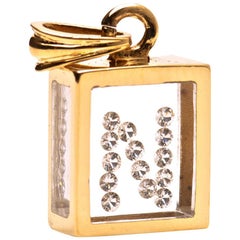Ciondolo con diamante fluttuante, oro giallo 14K, lettera "N", Incogem