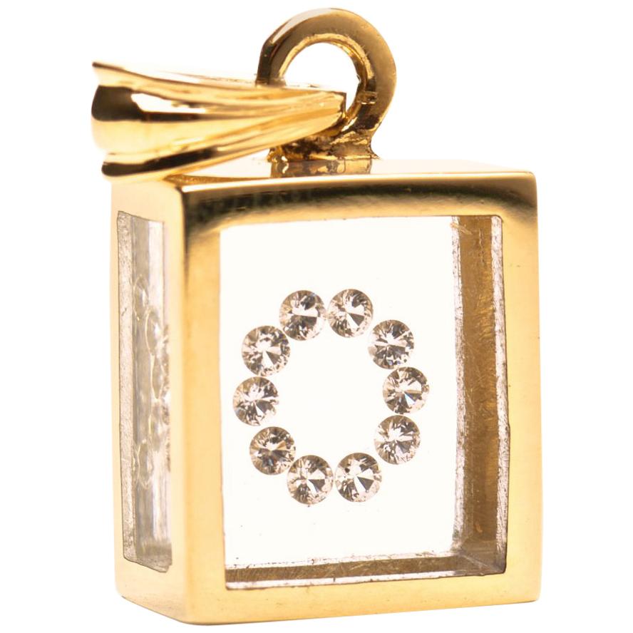 Incogem Floating Diamond Pendant: 14k Yellow Gold (Letter O) For Sale