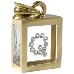 Colgante de Diamante Flotante Incogem: Oro Amarillo 14k (Letra Q)