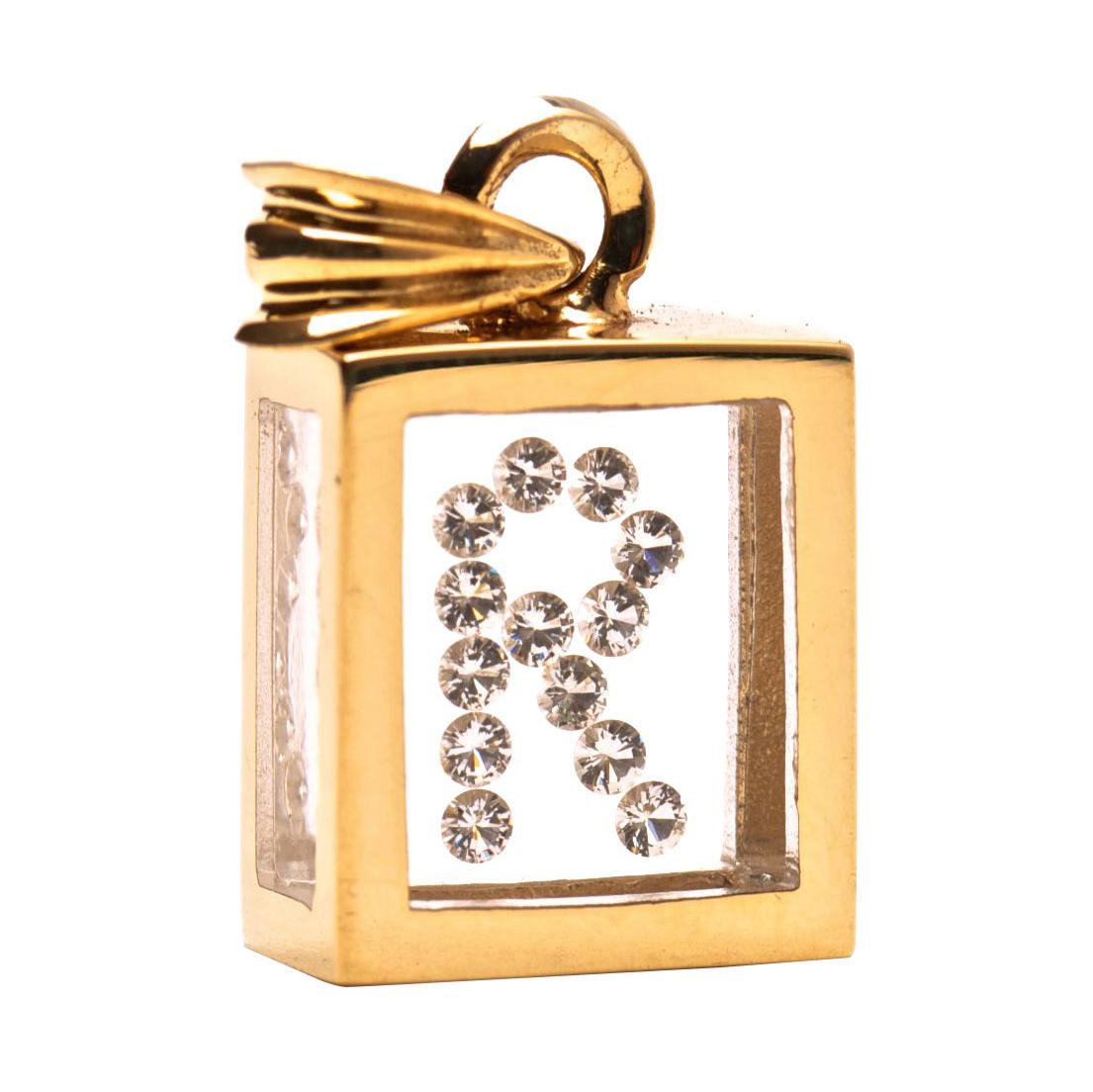 Ciondolo con diamante fluttuante, oro giallo 14K, lettera "R", Incogem