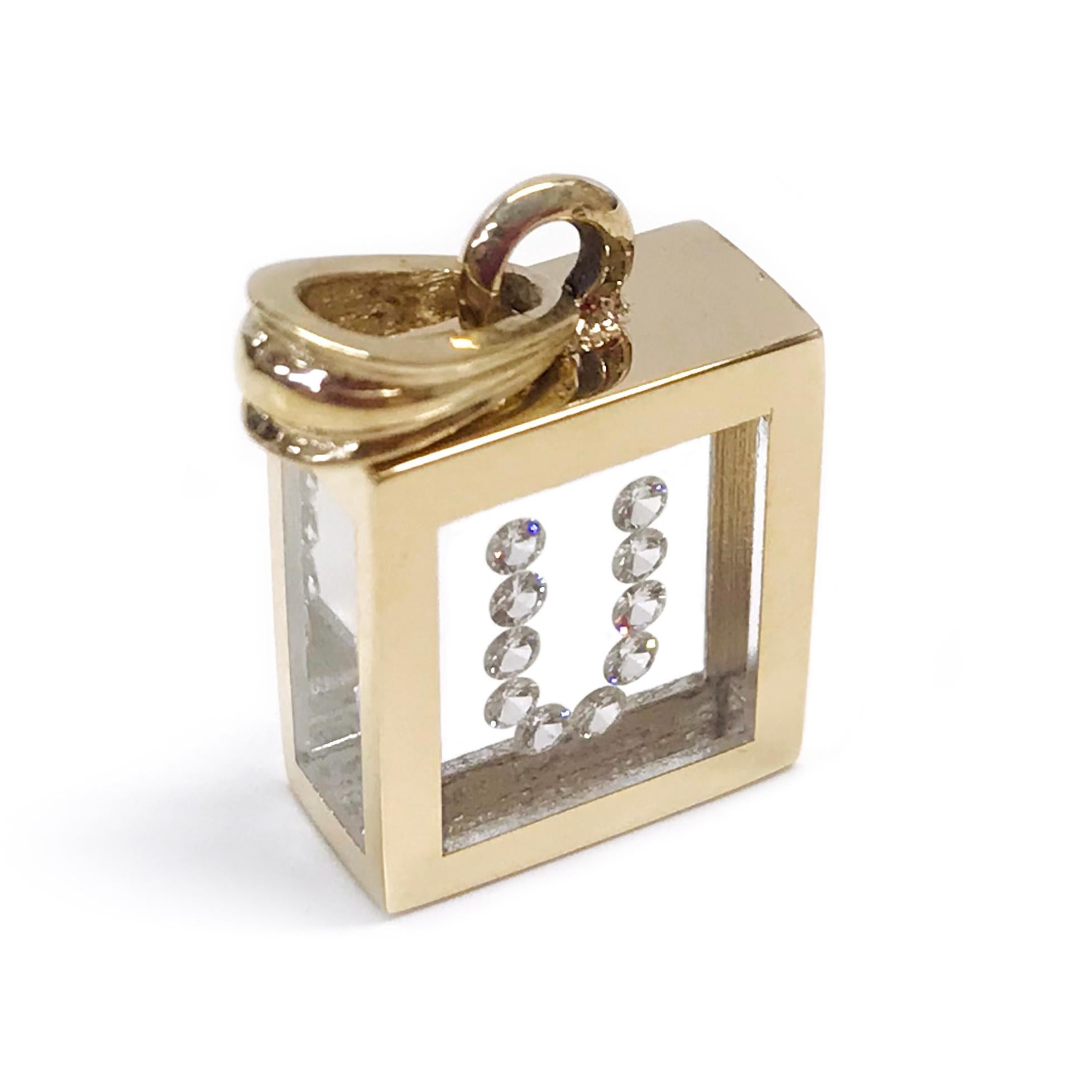 Pendentif en diamant flottant Incogem : or jaune 14k, disponible en lettres A-Z. Les pendentifs sont fabriqués à la main en or jaune 14k recyclé. Les diamants sont de taille brillant, 58 facettes, de pureté VS1 (G.I.A.) et de couleur H (G.I.A.).