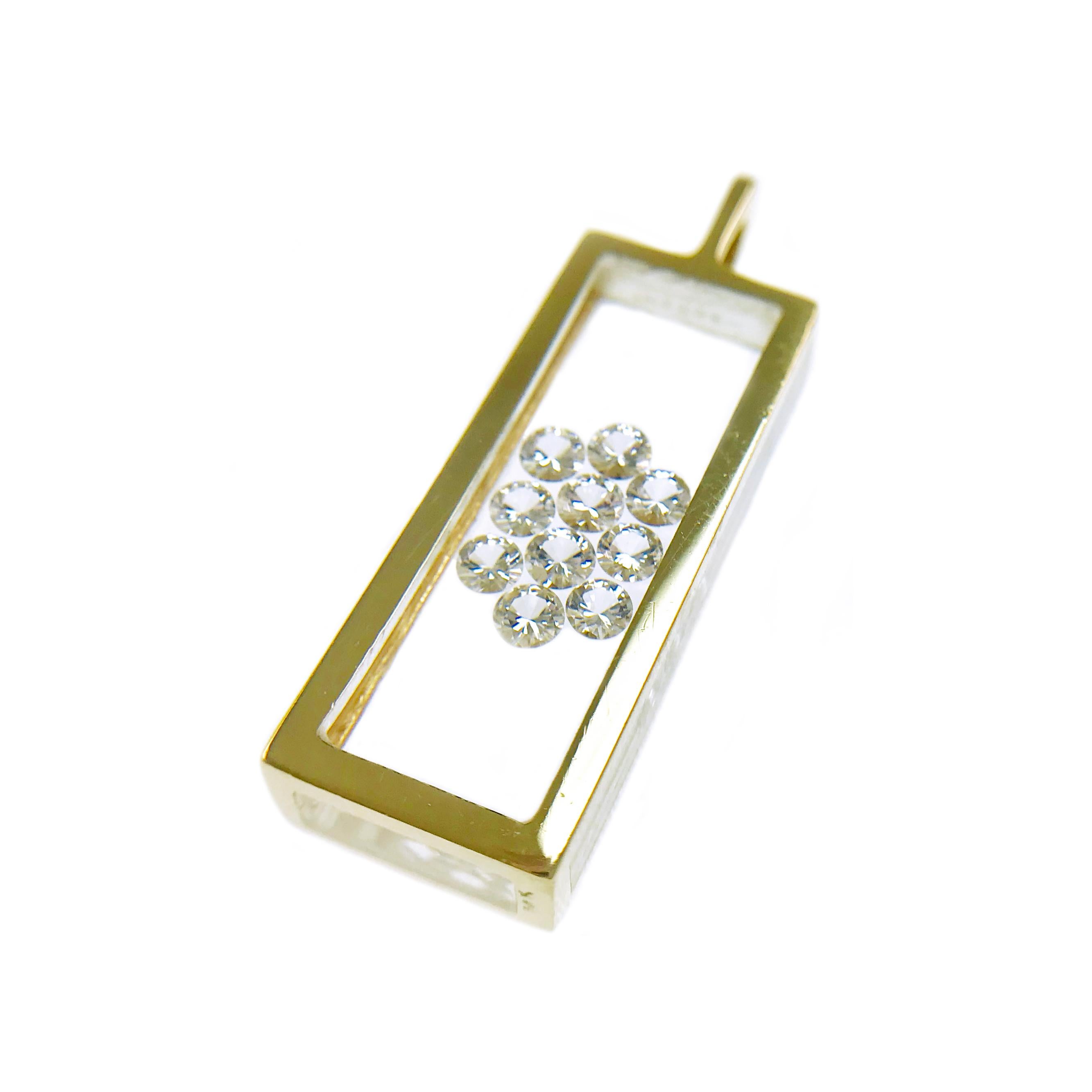 Incogem Floating Ten-Diamond Pendant, 14k Yellow Gold. The pendant is handcrafted of recycled 14k yellow gold. The diamonds are brilliant cut, 58 facets, VS1 in clarity (G.I.A.) and G in color (G.I.A.). Each diamond measuring 3.0mm each, 1.00 carat