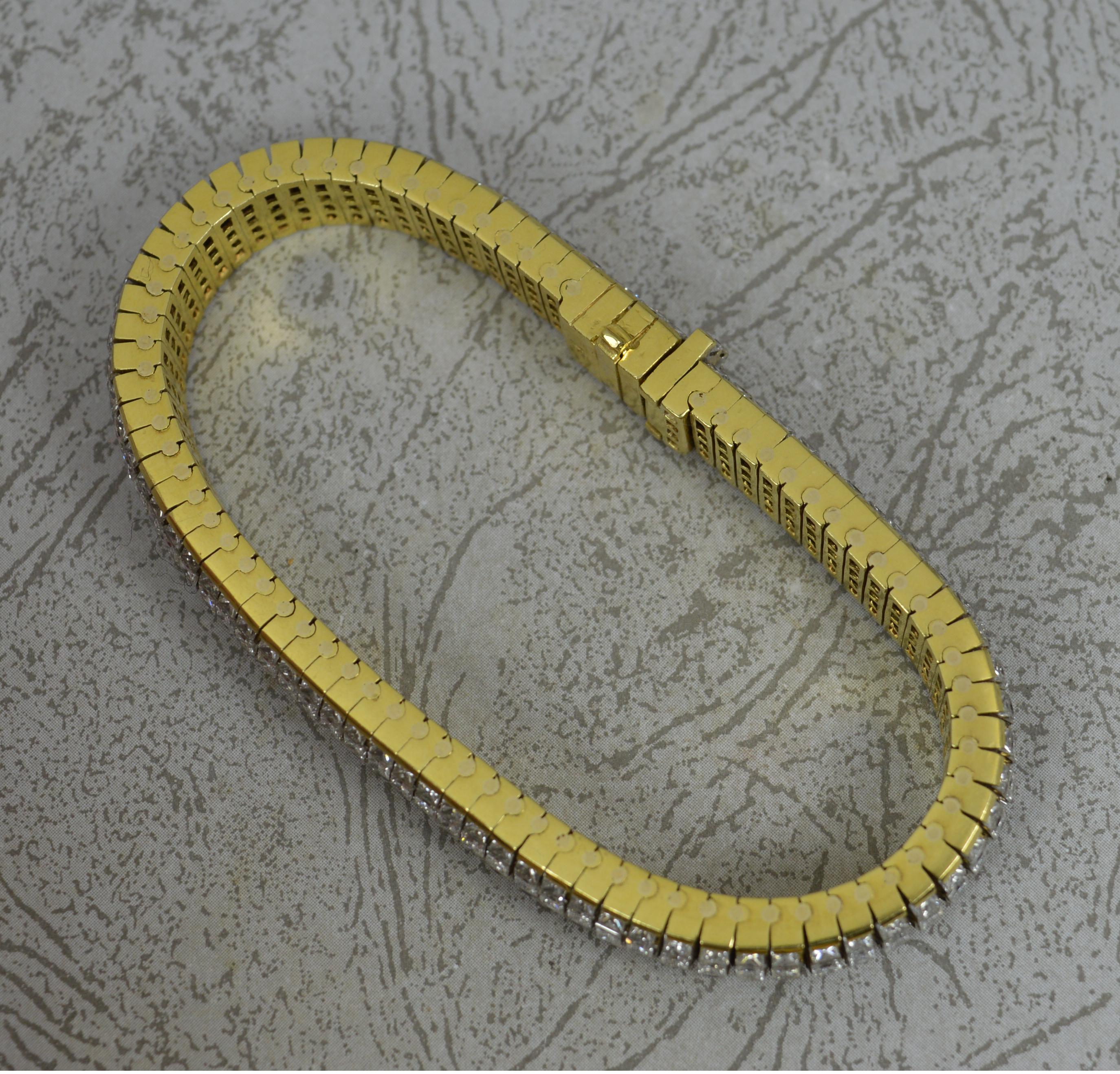 A stunning diamond and gold bracelet.
Very heavy and solid 18 carat yellow gold example. Almost 60 grams.
Set with a significant number of natural, untreated, princess cut diamonds throughout the 7 inch length. A total of 16 full carats. Very clean,