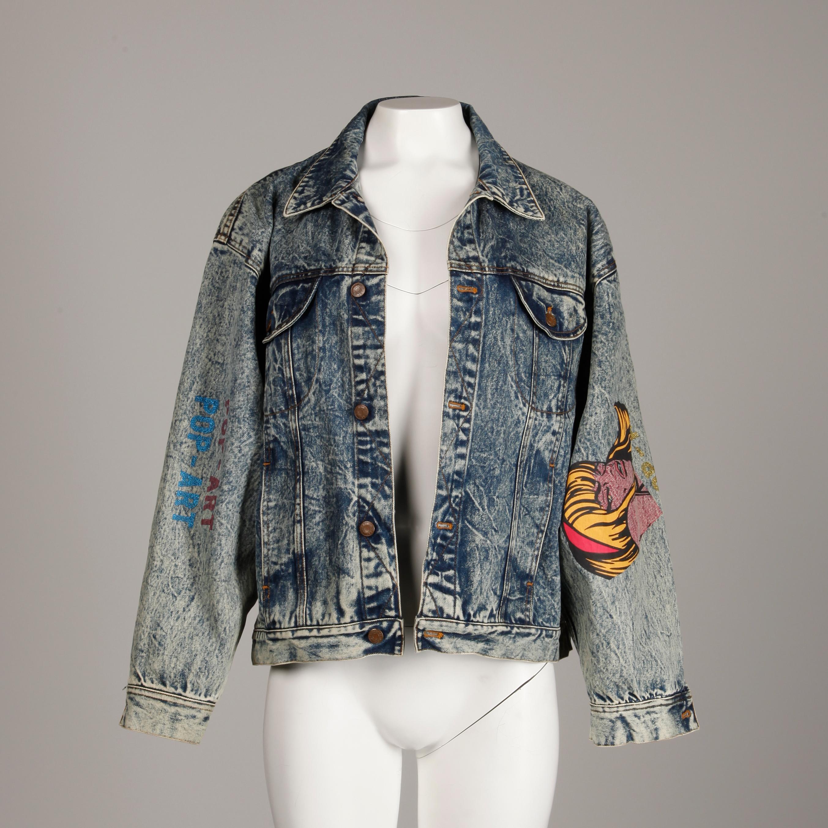 Absolutely incredible vintage 1980s pop art jacket by Et Vous with a comic book graphic and acid washed denim. Unlined with front button closure and button closure at wrists. 100% cotton. The marked size is 1, but the jacket will fit most sizes