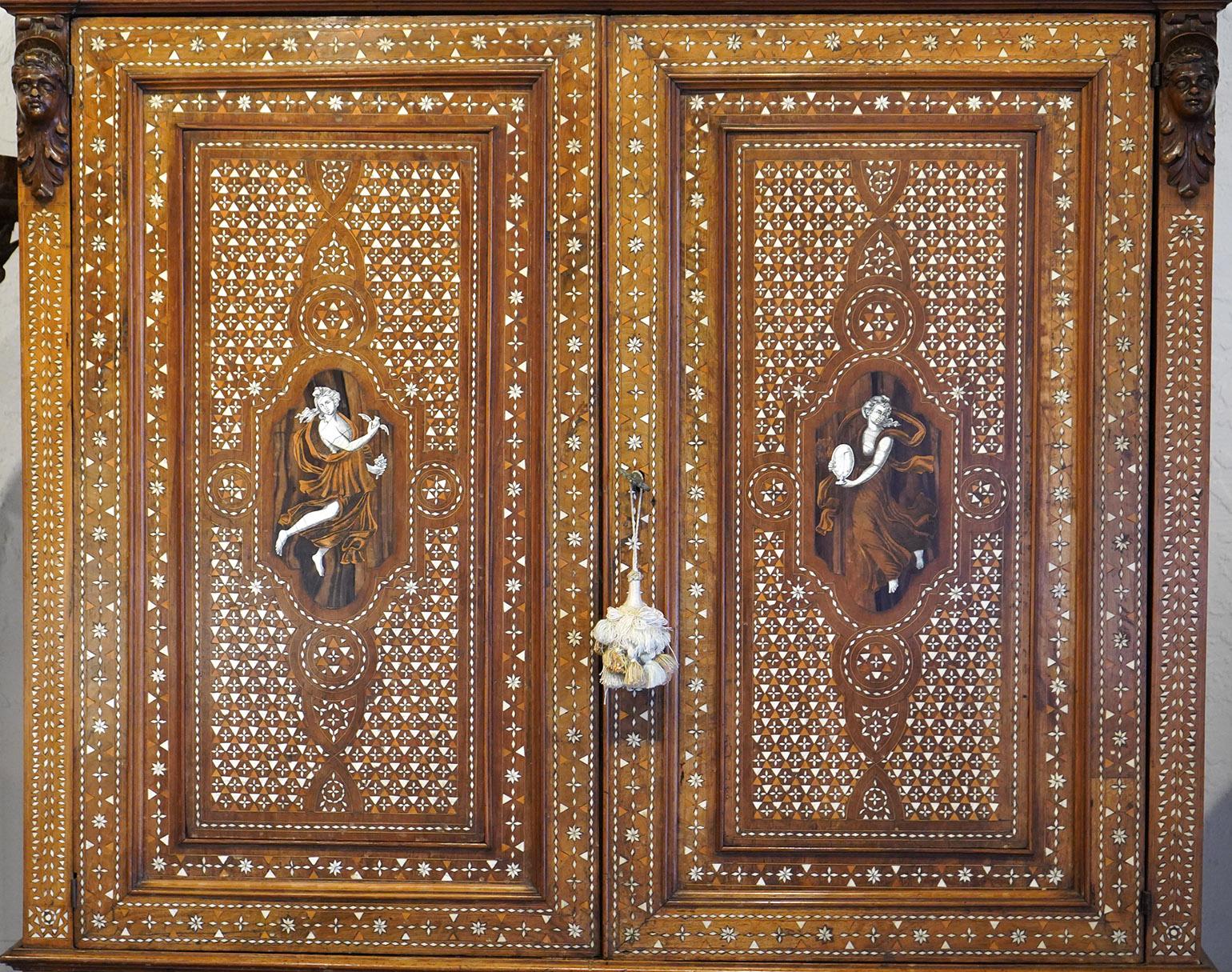 Wonderful Italian cabinet with 2 doors and 4 drawers. Fabulous inlay with figural inlay on the doors. 19th century. Condition is wonderful based on age. Some minor missing inlays or moldings. VERY MINOR. 100