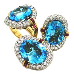 60's BULGARI set in blue topaz, diamonds and rubies. Ring and earrings