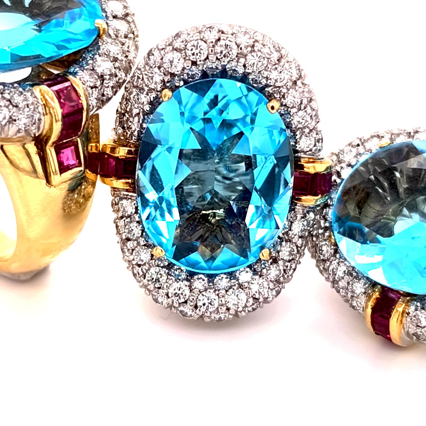 Women's 60's BULGARI set in blue topaz, diamonds and rubies. Ring and earrings For Sale