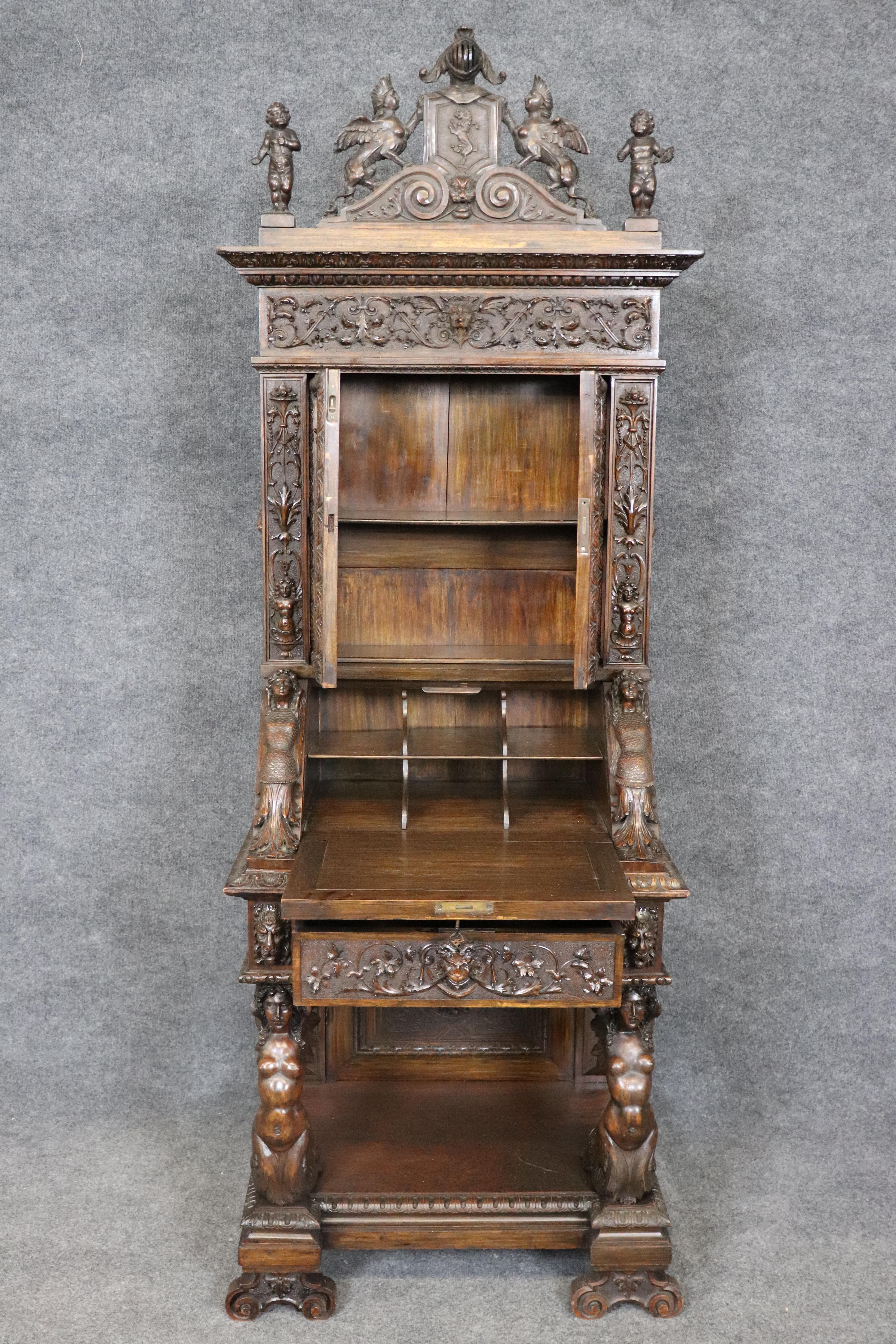 This is a fantastic piece of furniture with a history. The cabinet originally was commssioned for a steel mangate who lived in Pittsburgh PA especially for him. His grand daughter inherited the piece and was always wondering about it because of its