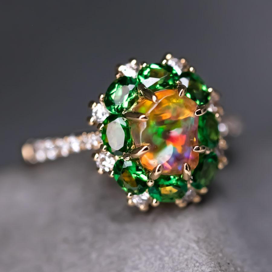 Unglaubliche Farbe Mexikanische Feuer Opal Tsavorit Diamant Verlobungsring 18K Gelbgold.


Kostenloser Inlandsversand mit USPS First Class! Kostenlose Geschenktüte oder -box zu jeder Bestellung!

Der Opal, die Königin der Edelsteine, ist einer der