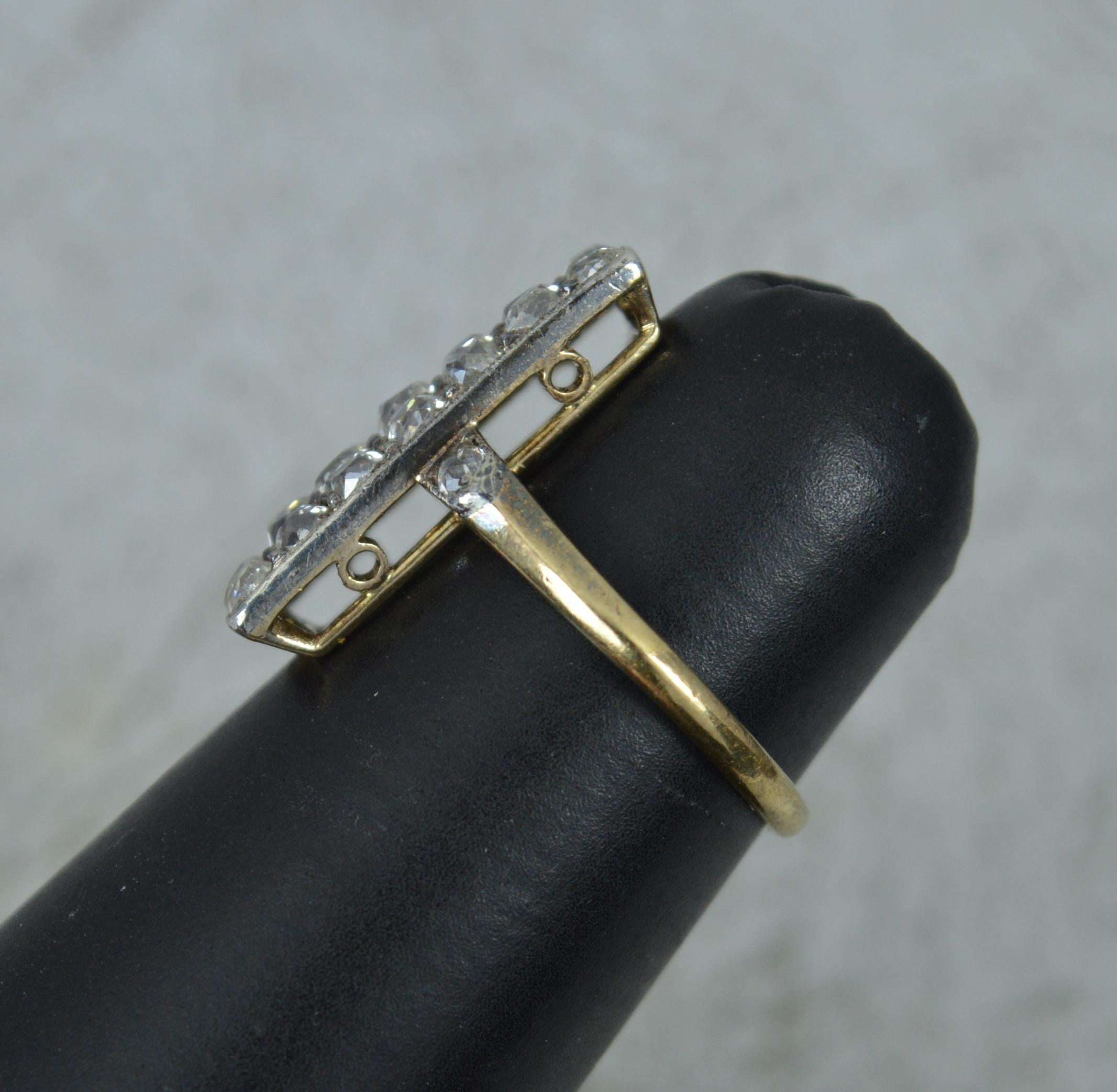 A superb Edwardian come Art Deco era cluster ring.
Solid 18 carat yellow gold example with a platinum head setting.
Designed with a large rectangular panel, 10mm x 19mm approx. Set with 28 natural diamonds with an additional two to the