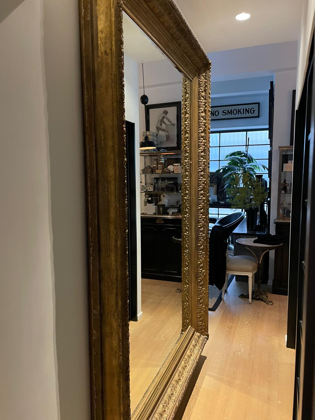 Incredible European Extra Large Frame 
circa 1900
made of wood, plaster and gilt gold details
Plaster work has been restored but there is one small recent chip
Currently wall mounted but would also be a great leaner given its size.

The