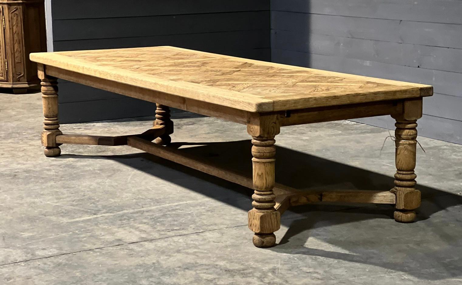 We are very pleased to offer an one off incredible over 3M Solid Oak Dining Table and very rarely deep at 112 cm, originating from France and made from solid oak, having a parquetry oak top and dating to the early 1900s. Of excellent quality
