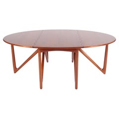 Increíble mesa de comedor de hojas abatibles de diseño danés de mediados de siglo de Niels Koefoed