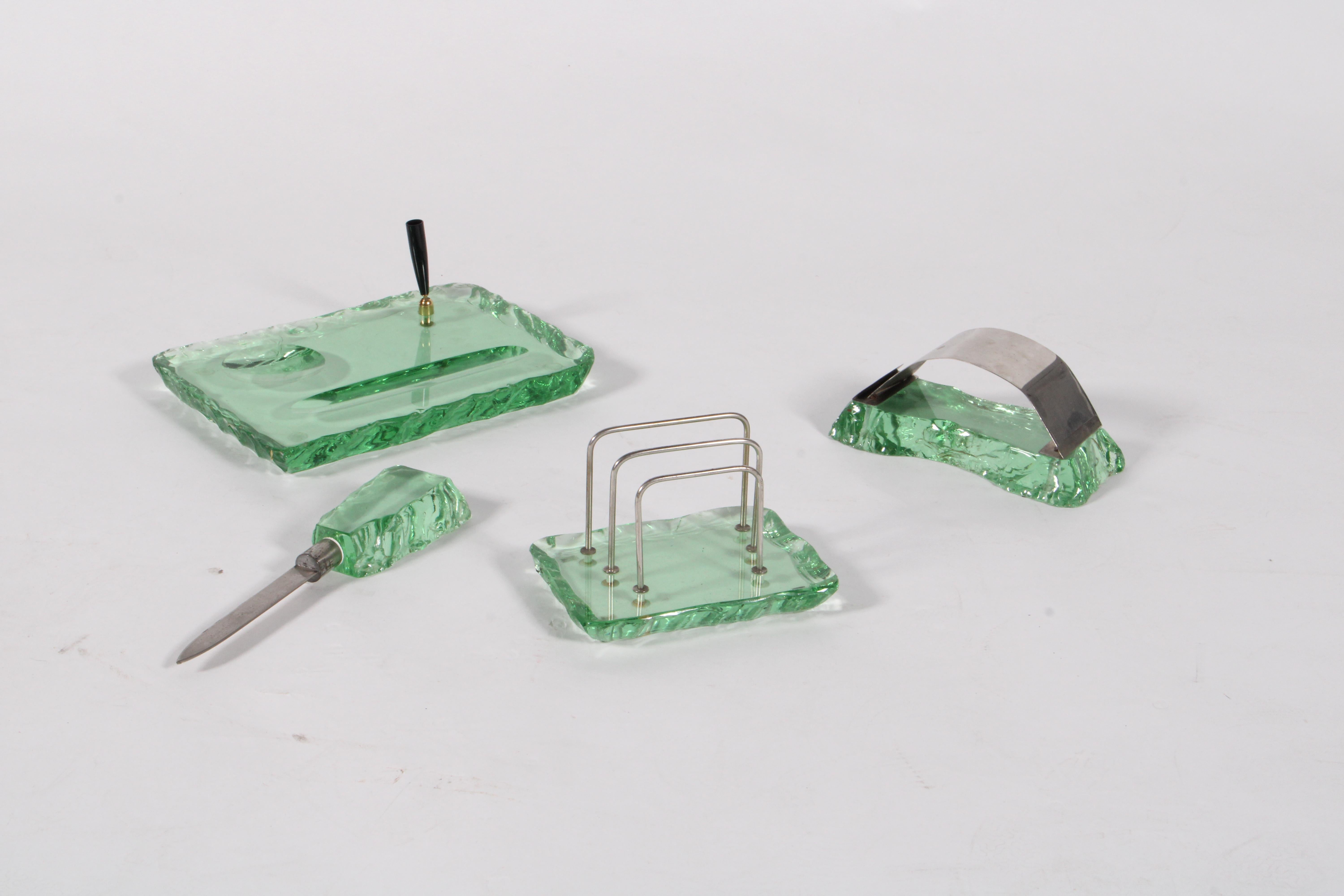 A rare and wonderful complete original desk set by Pietro Chiesa for Fontana Arte dating from around 1950. This stunning Italian set is meticulously crafted in cut glass with the rich vibrant green colour associated with the internationally renowned