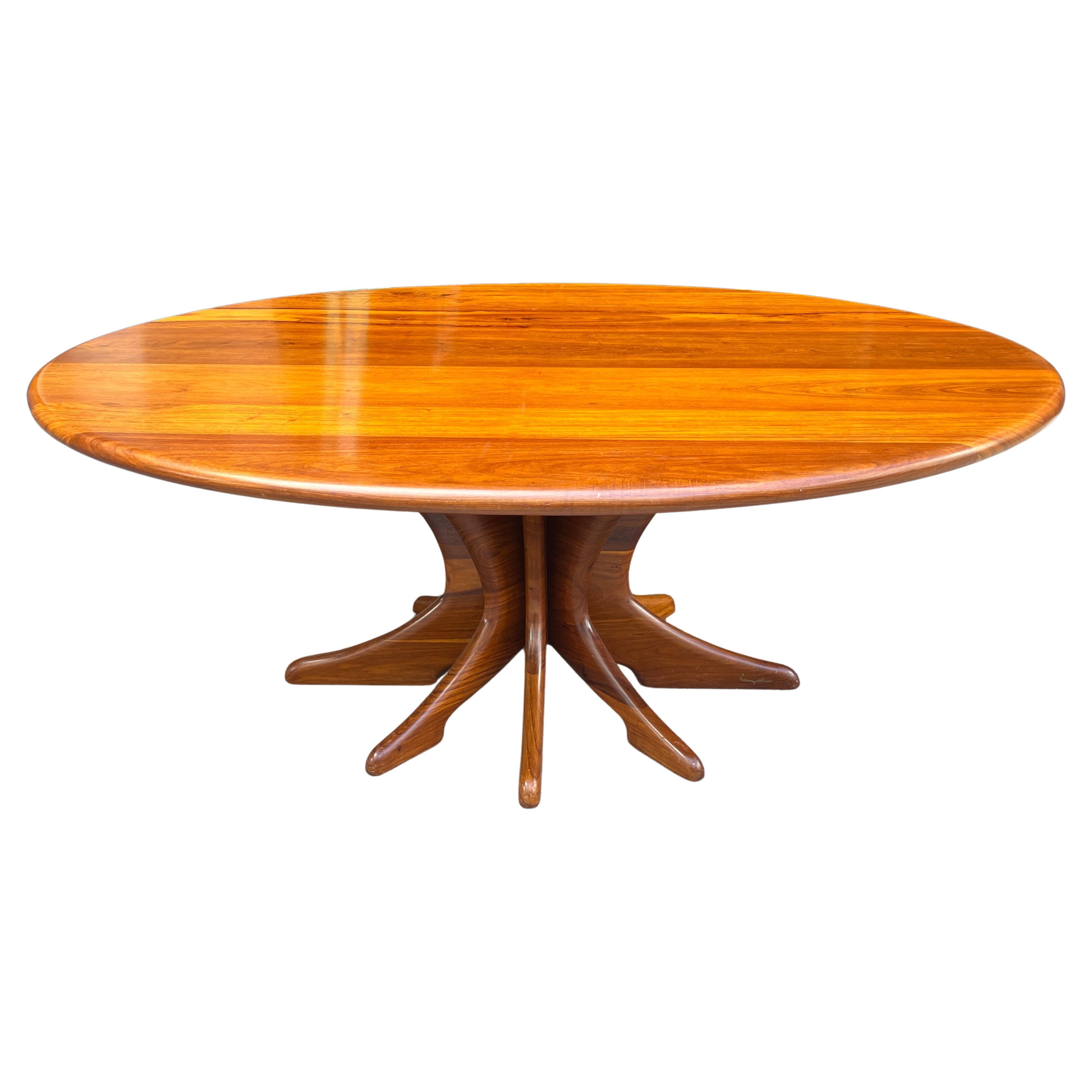 Spectacular and unique dining table with oval top on a 8 arms pedestal base. . Solid wood construction. Unique piece.
seats up to 8 chairs comfortably. Top can easily be removed for easy transport.

ht. 30, lg, 74, wd. 54 in.
