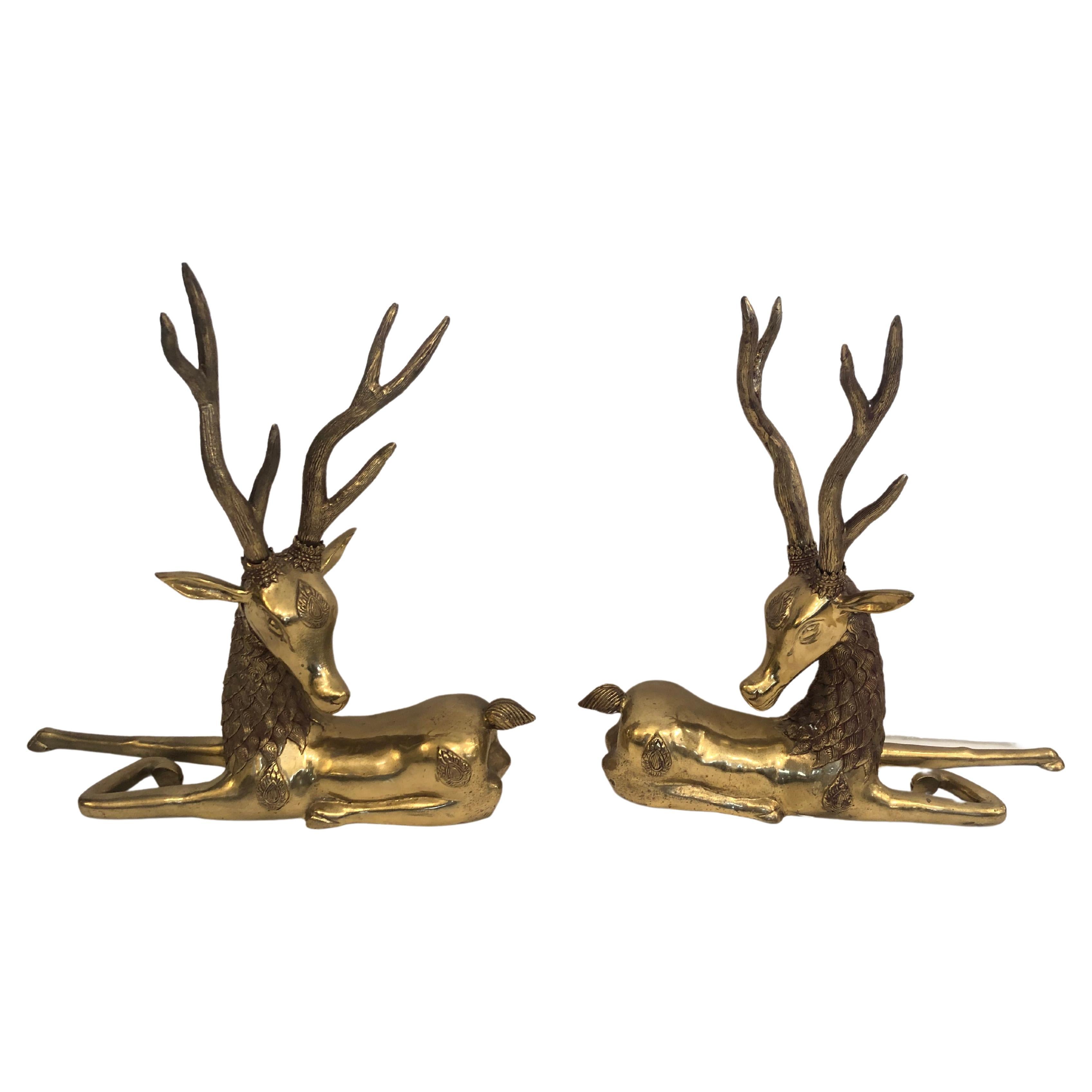 Incredible Pair of Solid Brass Reclining Stags with Impressive Antlers For Sale