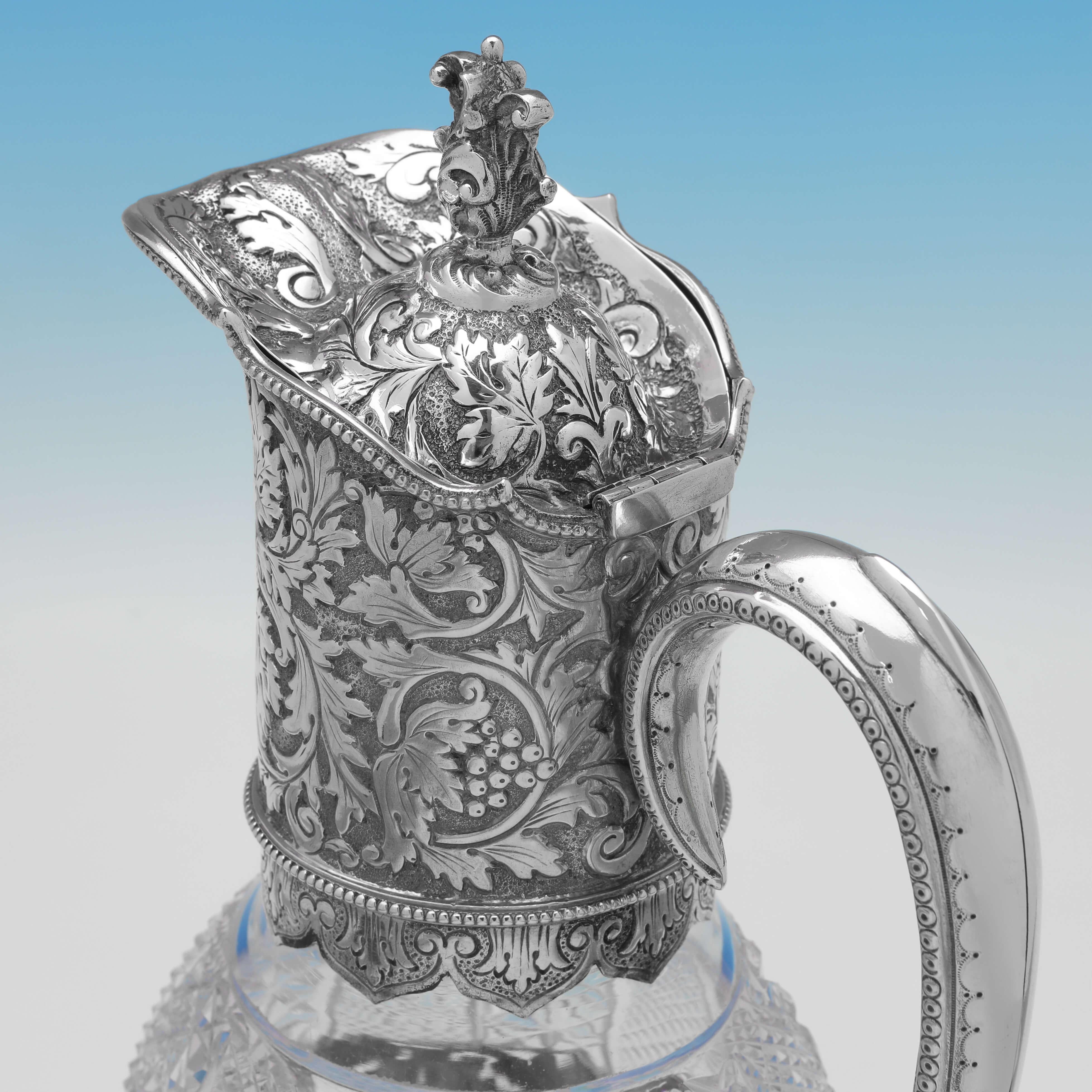 Late 19th Century Incredible Pair of Victorian Sterling Silver Claret Jugs Made in London in 1889 For Sale
