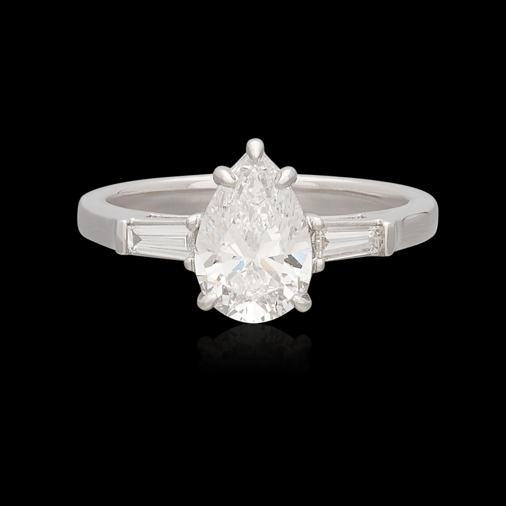 When only the best will do! This custom platinum ring features a near perfect 1.50 carat pear shaped diamond graded by the Gemological Institute of America as D color (as white as diamonds get!) and Internally Flawless clarity. The center diamond is