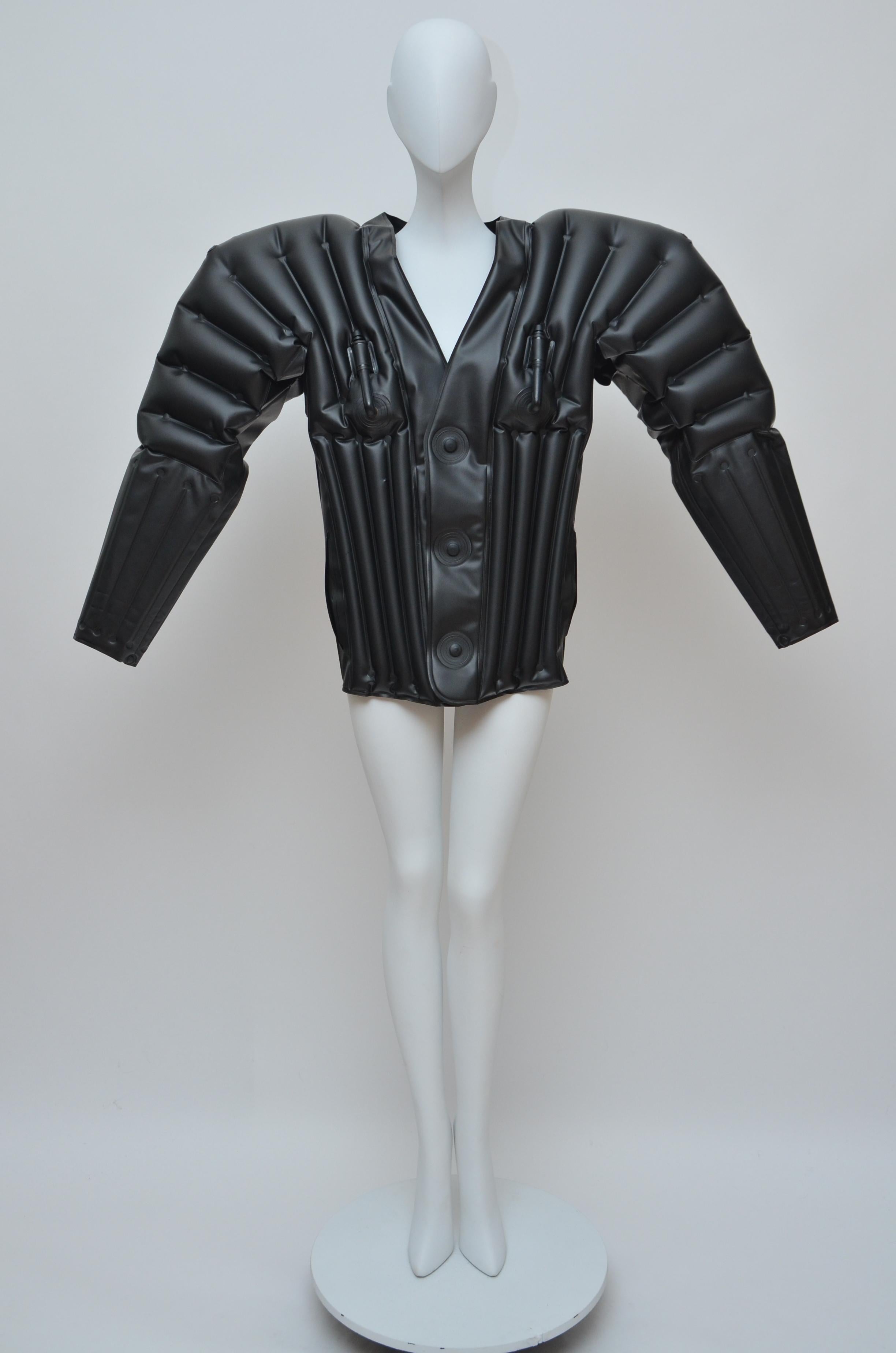 Incredible rare  Issey Miyake man's inflatable rubber jacket, 1987.
Two inflater tubes on the chest so booth sides are inflated separate.
Large press stud fasteners in the front.Lining moulded 