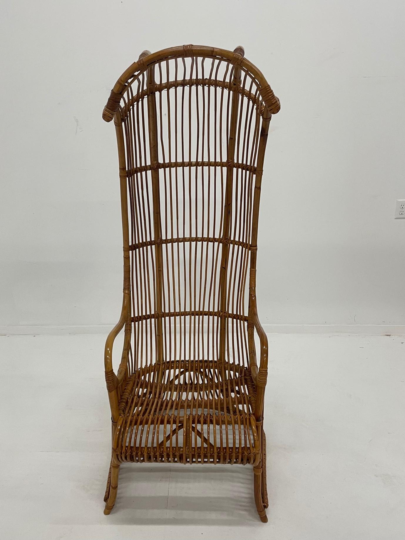 Indonesian Incredible Rare Vintage Rattan Porters Chair with Sculptural Silhouette For Sale
