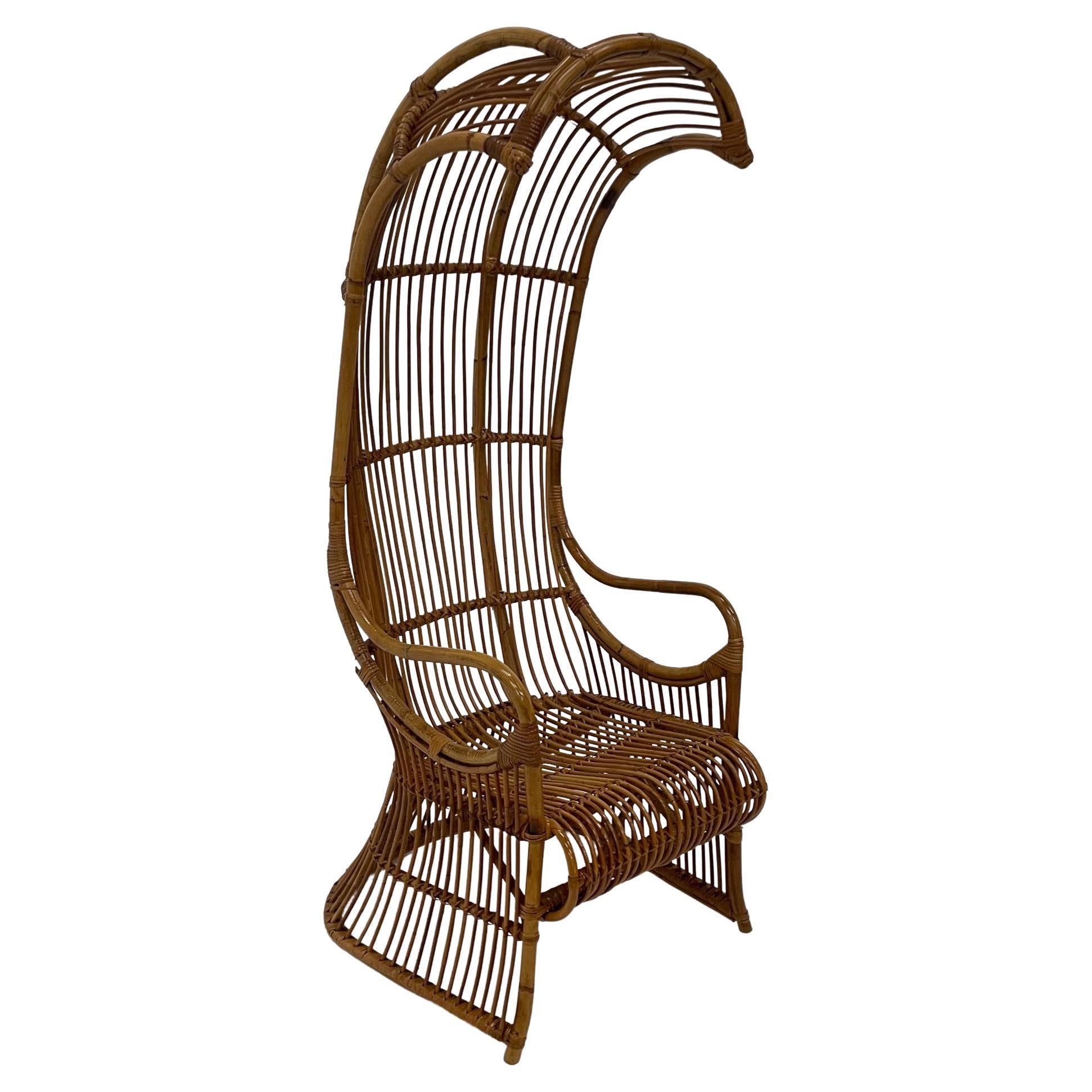 Incredible Rare Vintage Rattan Porters Chair with Sculptural Silhouette