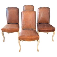 Incredible Set of Four 19th Century Distresed Leather Hoof Footed Chairs