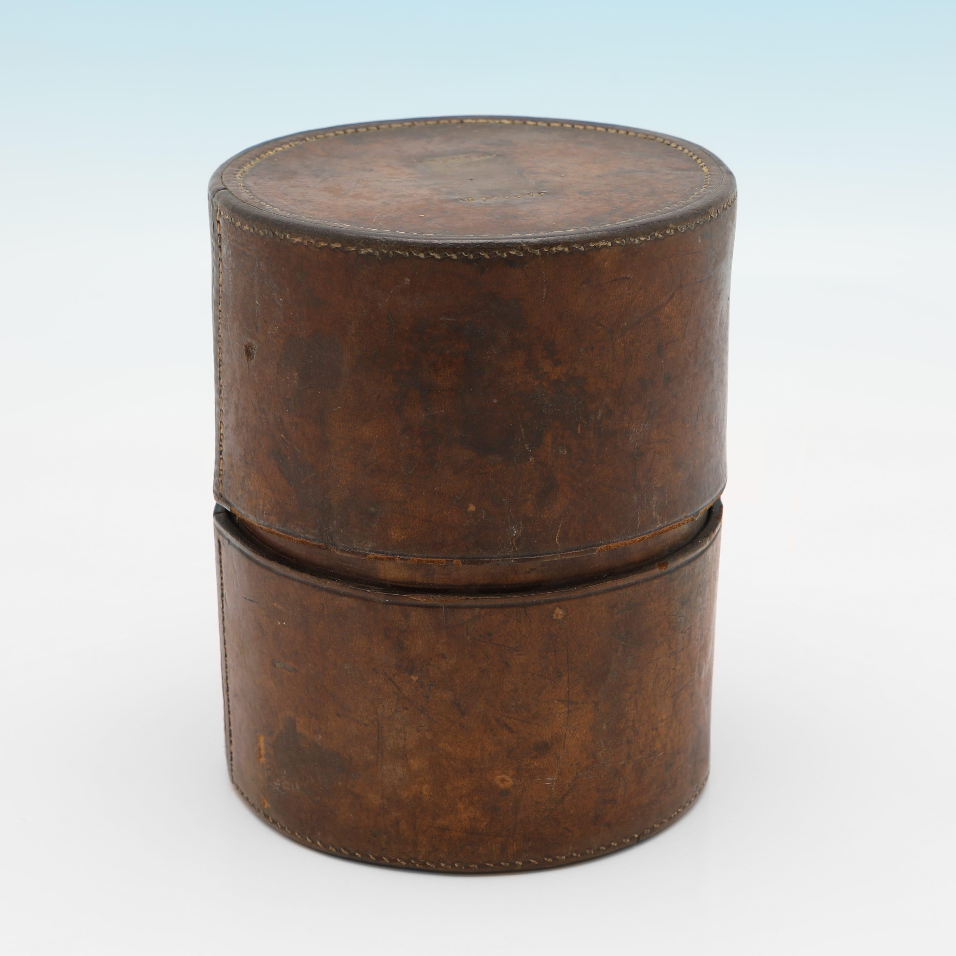 An interesting set of 6 stacking beakers and 6 shot glasses, presented in the original leather carrying case, with a leather spacer allowing the smaller shot glasses to stack inside also. The larger 6 beakers all hallmarked London 1861 by John