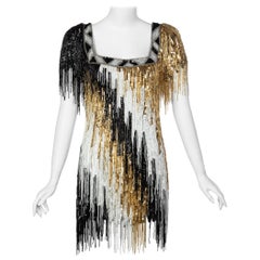 Bob Mackie - Magnifique robe courte vintage noire, blanche et dorée avec perles et franges