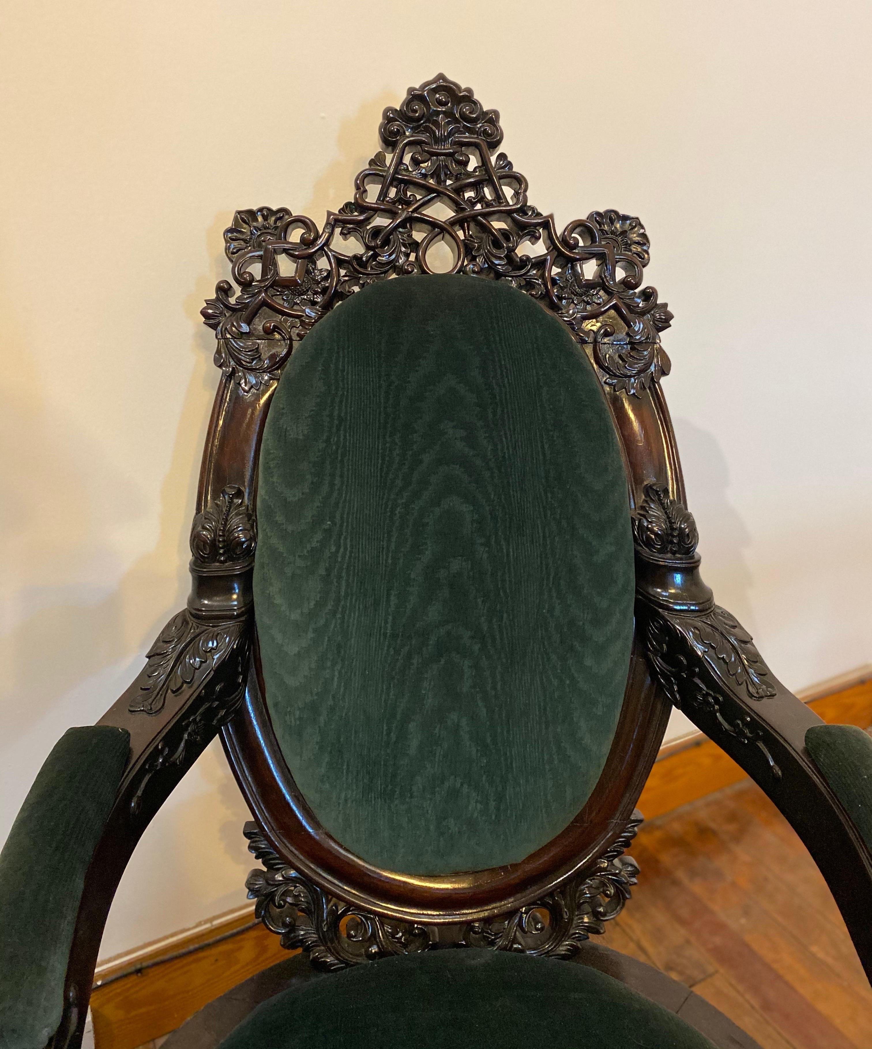 Incredibly carved 19th century Anglo-Indian rosewood palatial chairs. Highly carved from top to bottom with drop seats and backs. These chairs most likely came from a palace during the Raj period.