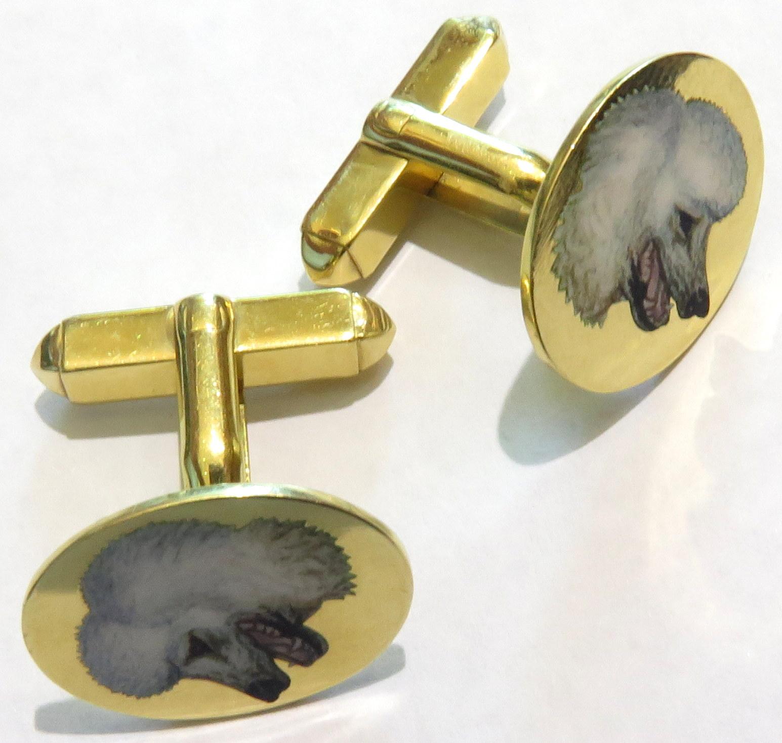 Beautifully detailed enamel on these unique poodle 18 karat gold cufflinks. These cufflinks are very easy to get on and off by yourself.  These cufflinks are marked PL, 750, and with English hallmarks.
Never be alone again with these two majestic