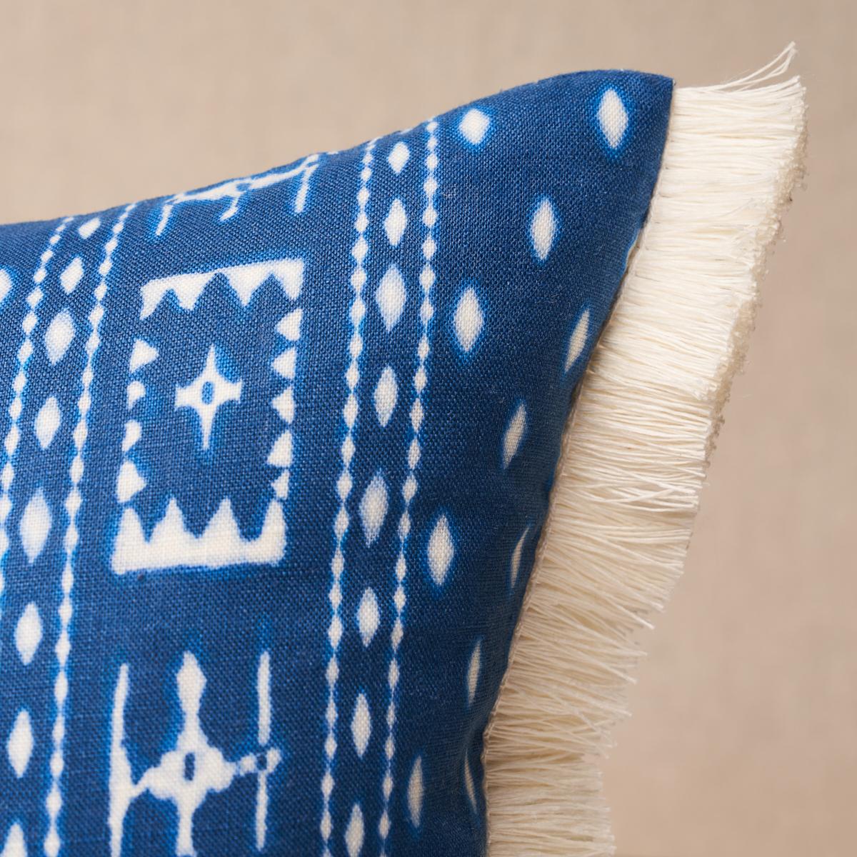 This pillow features Indah Batik with a knife edge finish on top and bottom. Inspired by traditional Indonesian resist-dye techniques, Indah Batik in indigo is a wonderfully versatile small-scale design that plays well with other patterns. Sides of