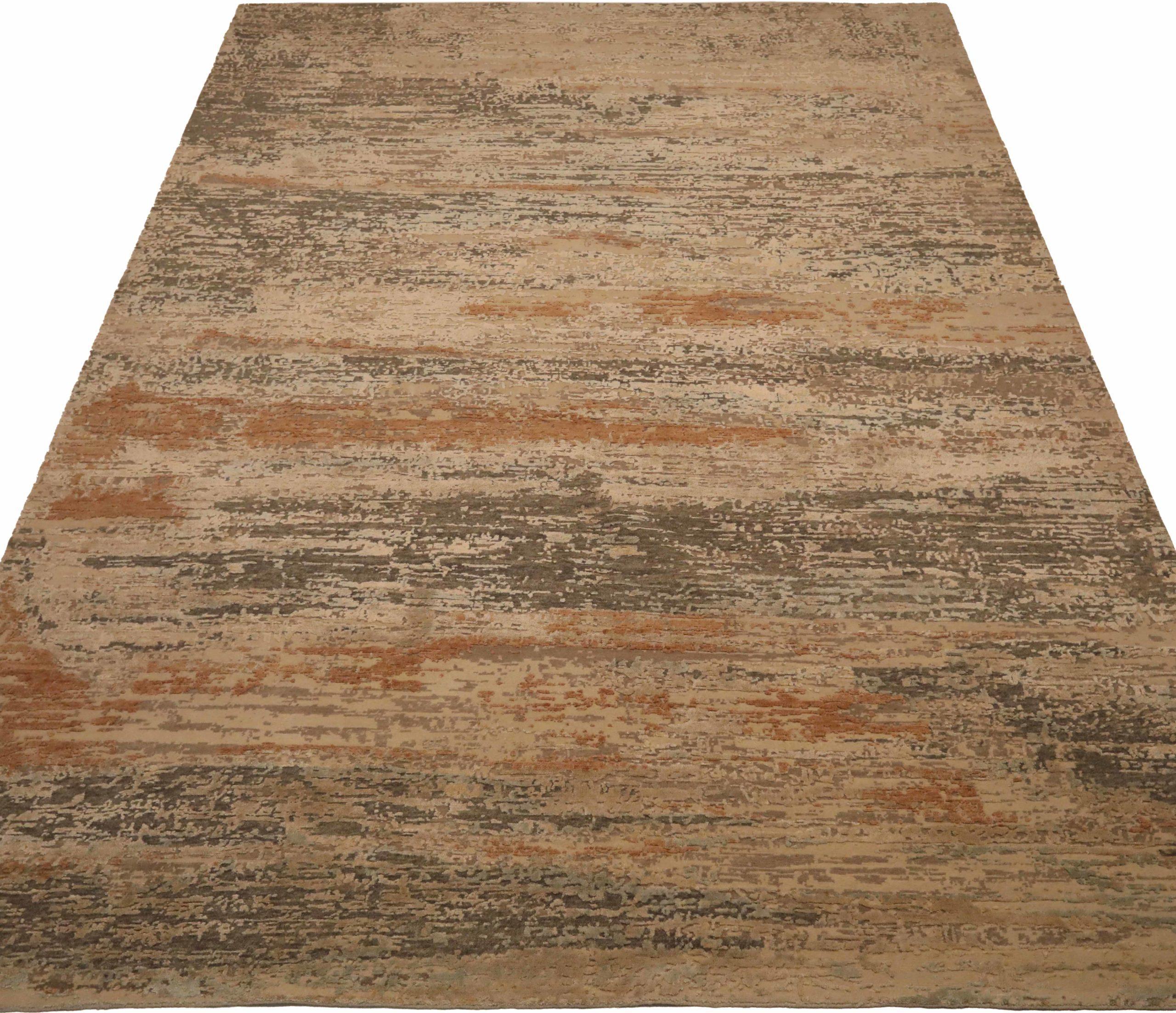 Entdecken Sie die Eleganz Indiens mit Teppichen aus der Zeit um 1990. Dieses exklusive Design aus Wolle und Braun-Elfenbein-Orange ist perfekt, um Ihren Raum zu verschönern.