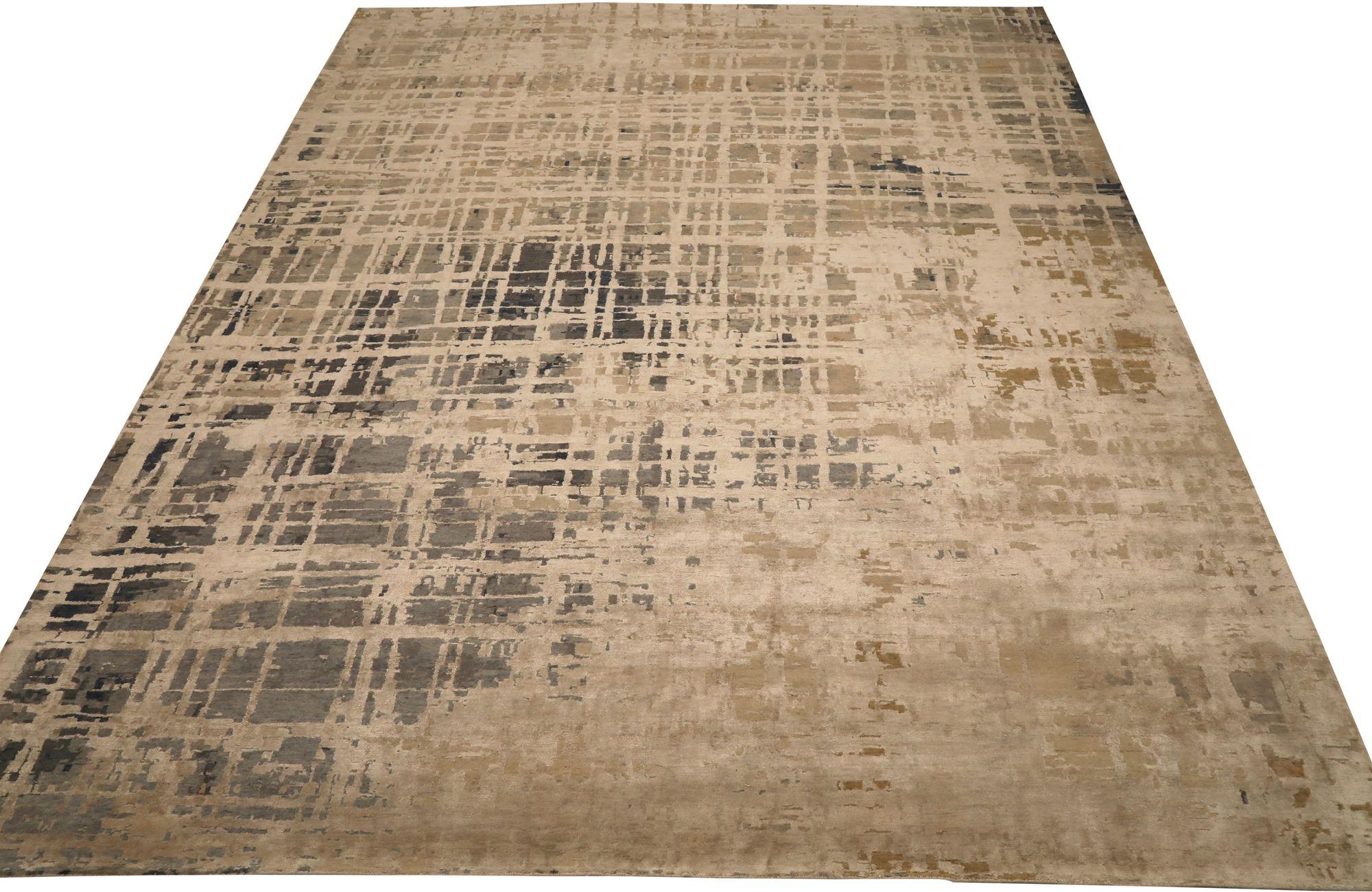 A Modern Indian Wool Area Rug 

This extraordinary rug manifests dynamic structural artistry and nuanced distressed textures. Its bold, abstract composition and refined, neutral palette provide an unparalleled foundation of visual intrigue and