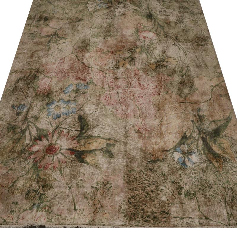 Découvrez l'élégance de l'Inde avec les tapis de sol de Circa 1990. Conçu avec de la laine et du bleu-vert-ivoire-rose-jaune, ce design exclusif est parfait pour mettre en valeur votre espace.